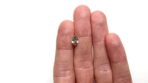 1.46ct 10.11x5.96x3.56mm VS1 C6 Geo Pear Step Cut 27082-03