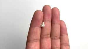 1.28ct 8.32x5.50x3.84mm GIA VVS1 U-V Pear Brilliant 27064-01