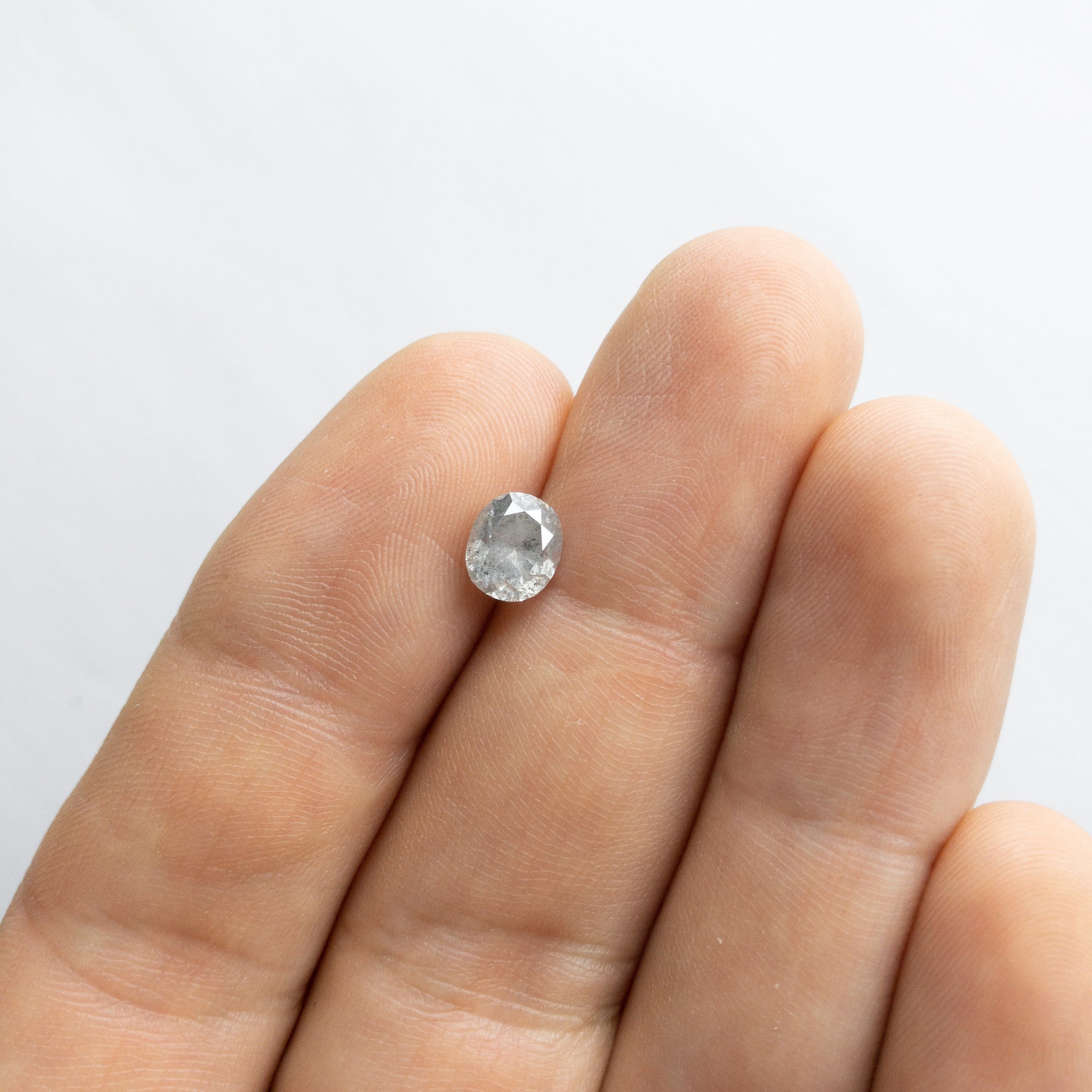 1.31ct 6.99x5.96x4.55mm Oval Brilliant 18027-05 - Misfit Diamonds