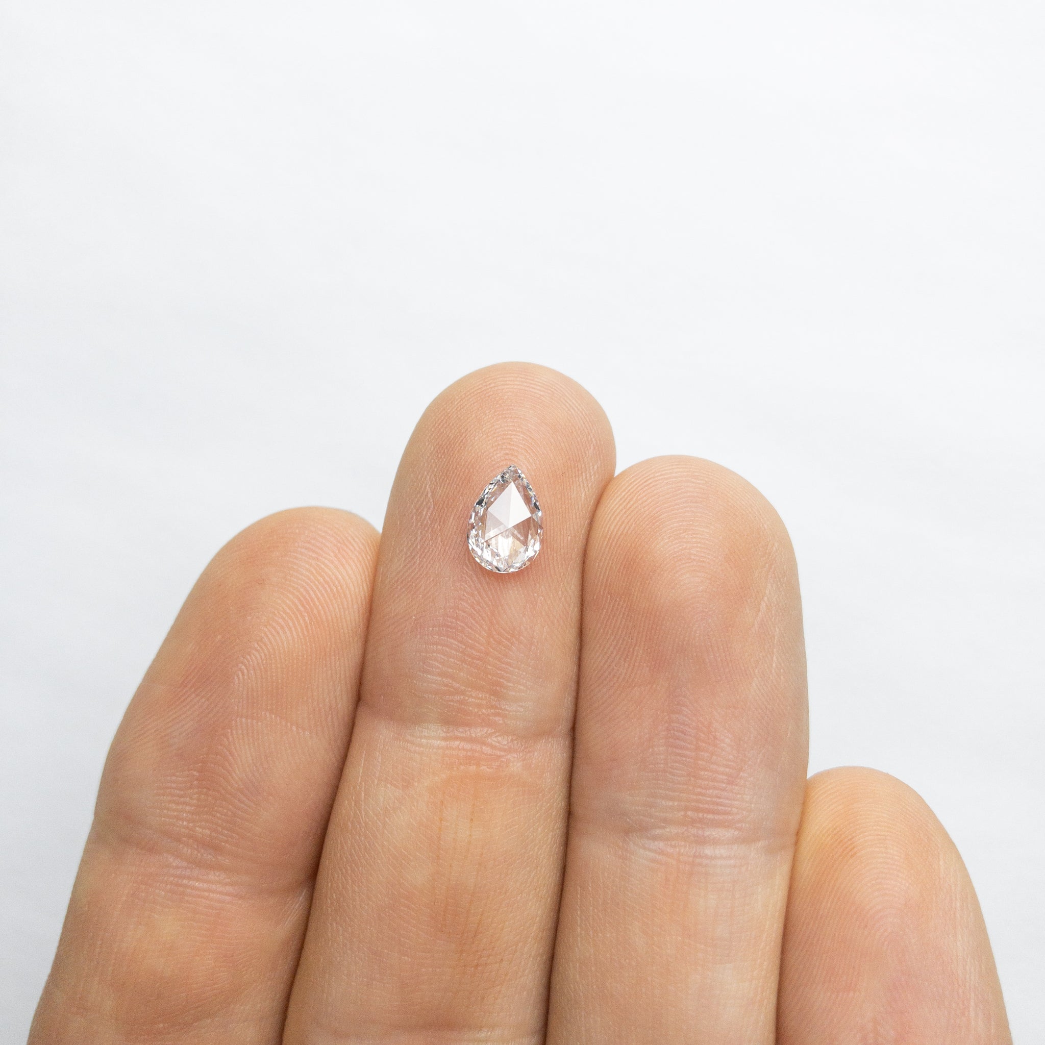 0.69ct 7.79x5.42x2.12mm Pear Rosecut 18052-01 - Misfit Diamonds