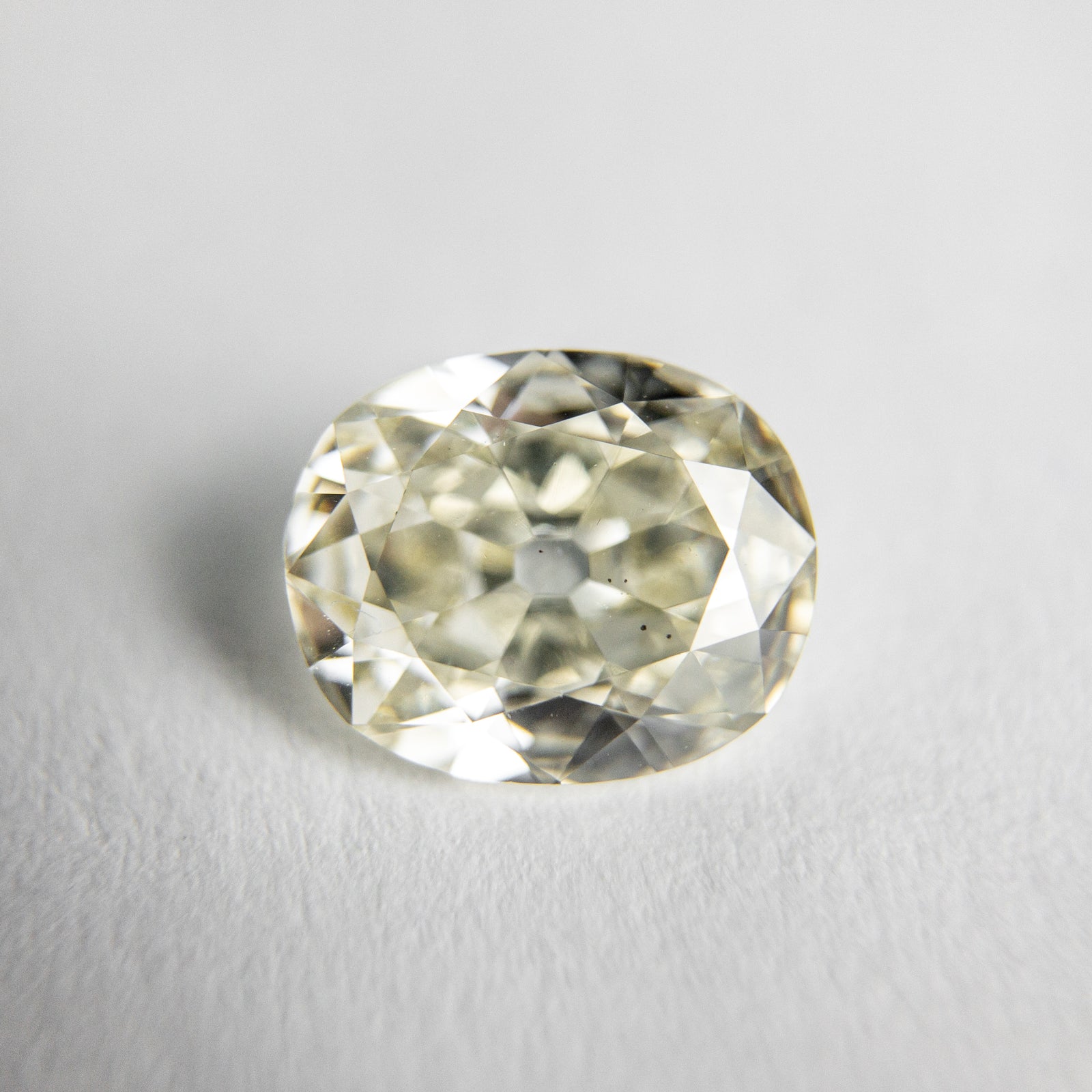 1.08ct 7.72x6.36x2.85mm SI1 K Oval Antique Cut 18053-05 - Misfit Diamonds