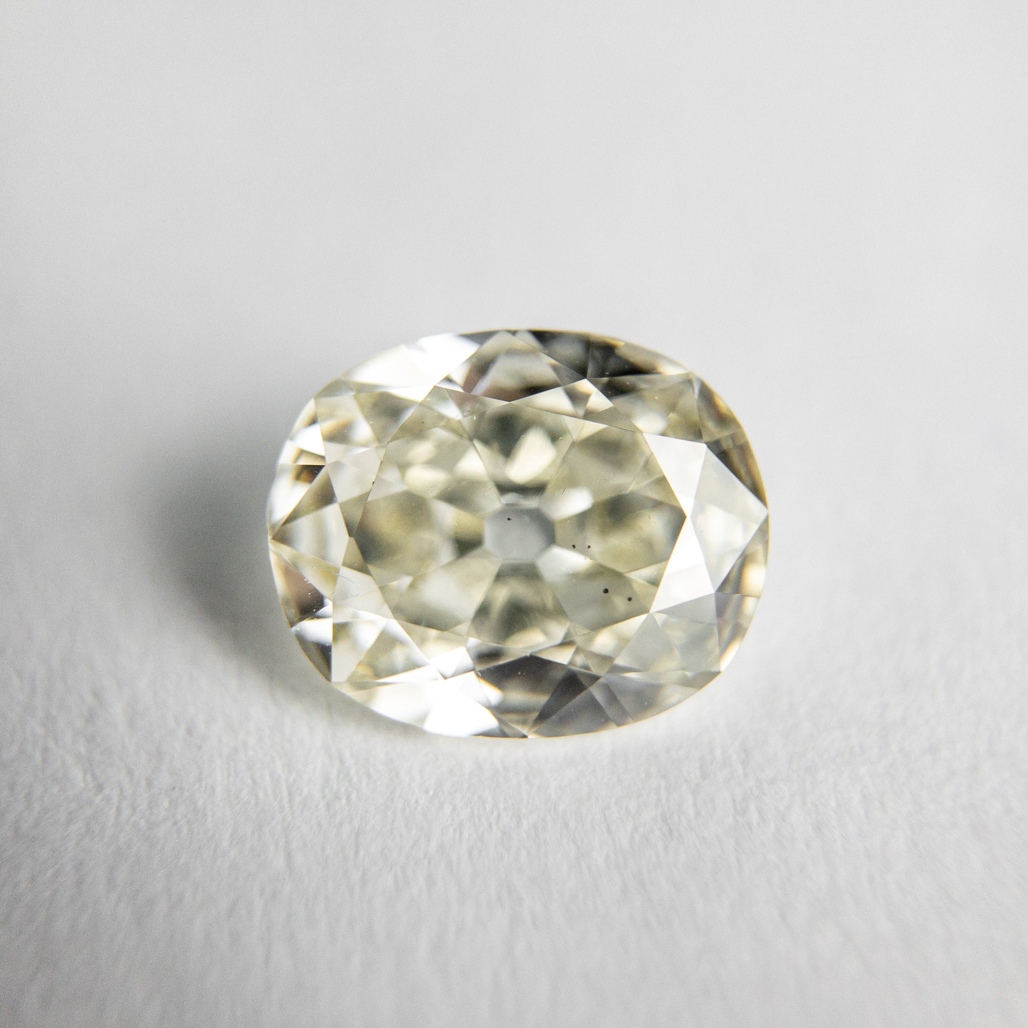 1.08ct 7.72x6.36x2.85mm SI1 K Oval Antique Cut 18053-05 - Misfit Diamonds