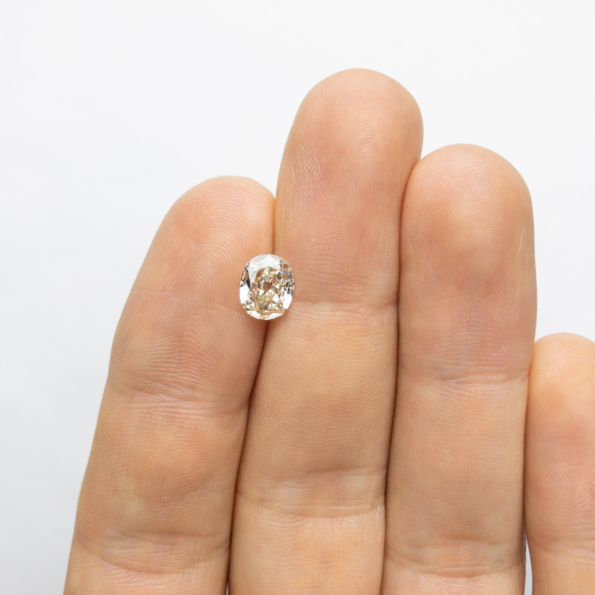 1.08ct 7.72x6.36x2.85mm SI1 K Oval Antique Cut 18053-05 - Misfit Diamonds