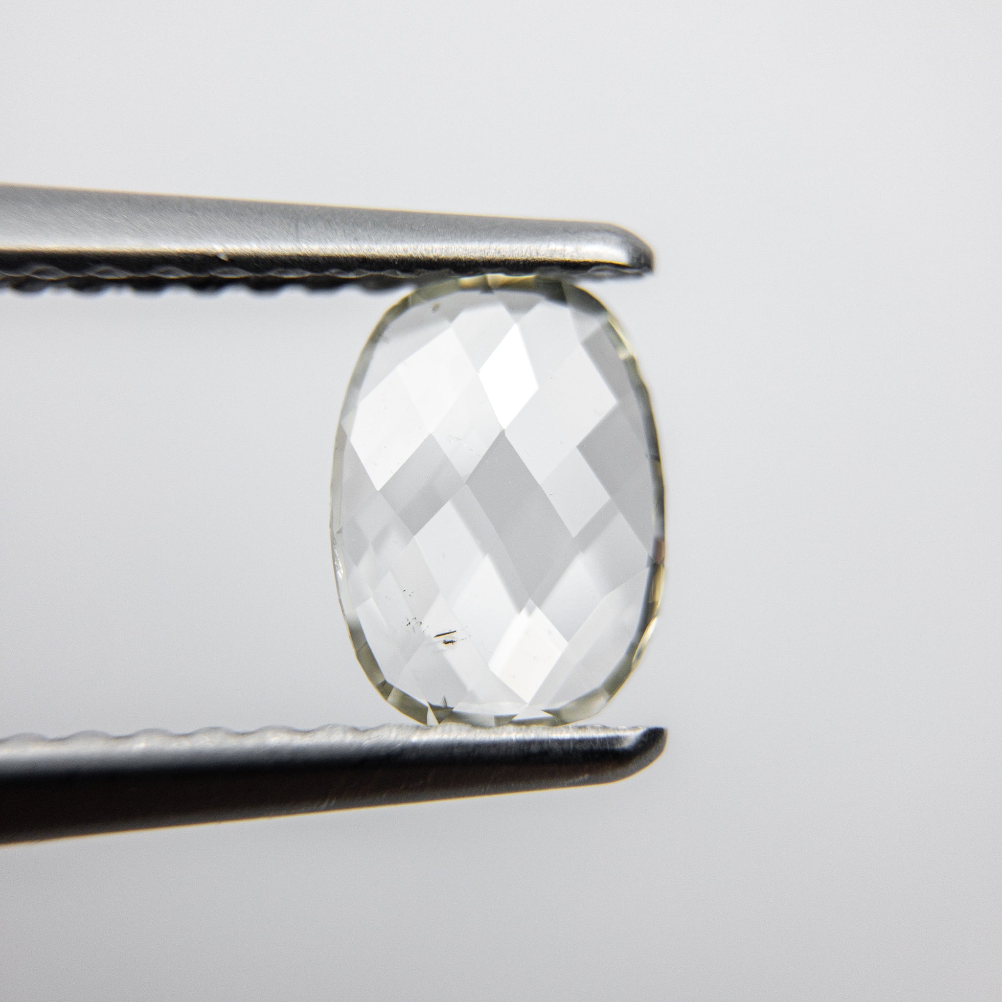 0.48ct 7.06x5.21x1.32mm SI2 M Oval Rosecut 18090-09 - Misfit Diamonds