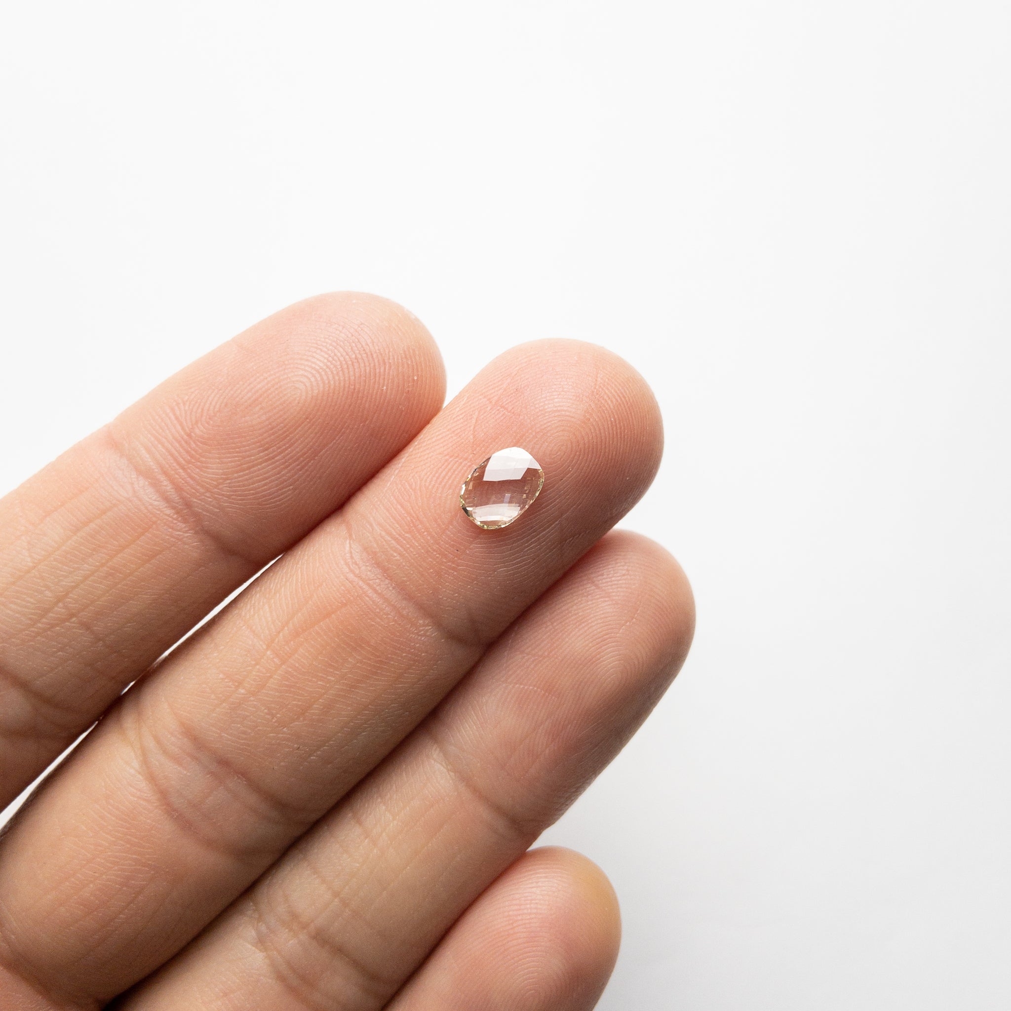 0.48ct 7.06x5.21x1.32mm SI2 M Oval Rosecut 18090-09 - Misfit Diamonds