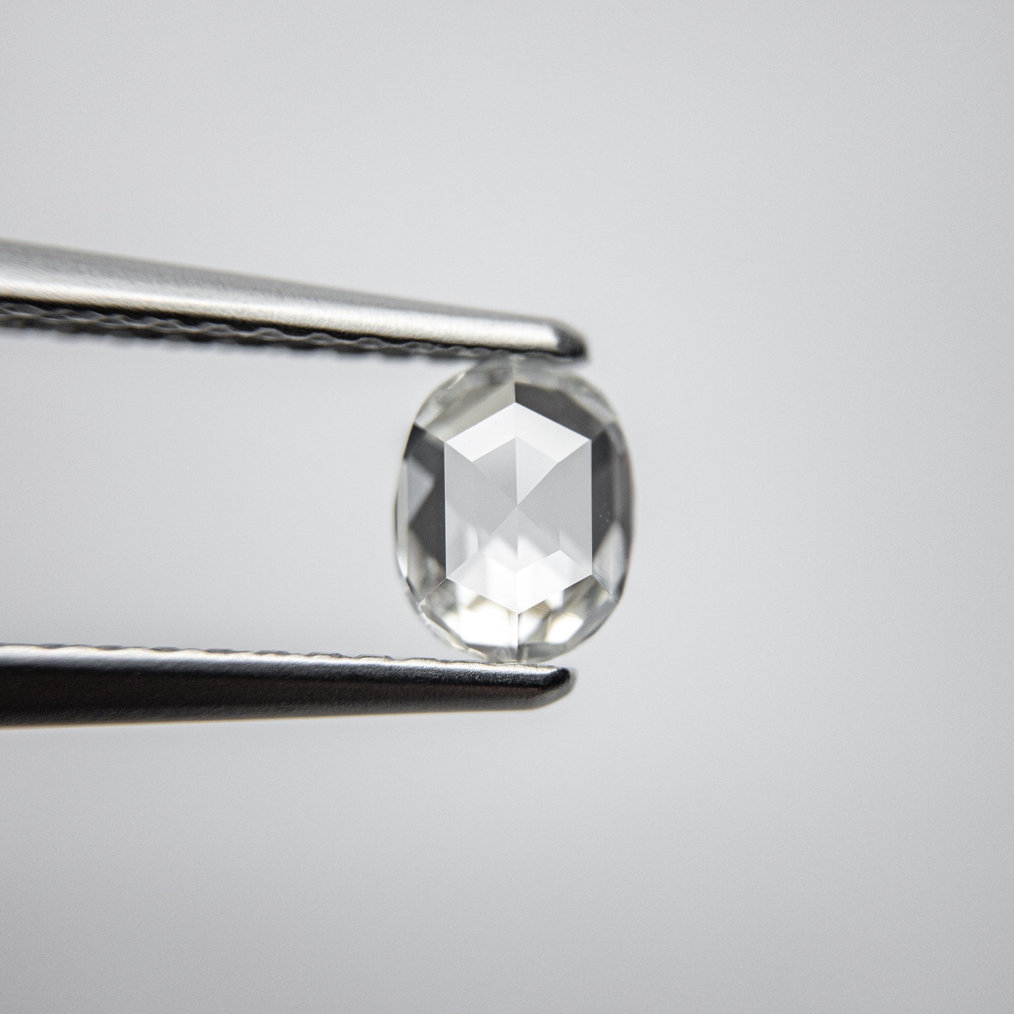 0.55ct 5.61x4.45x2.20mm VS2 I/J Oval Rosecut 18107-01 - Misfit Diamonds