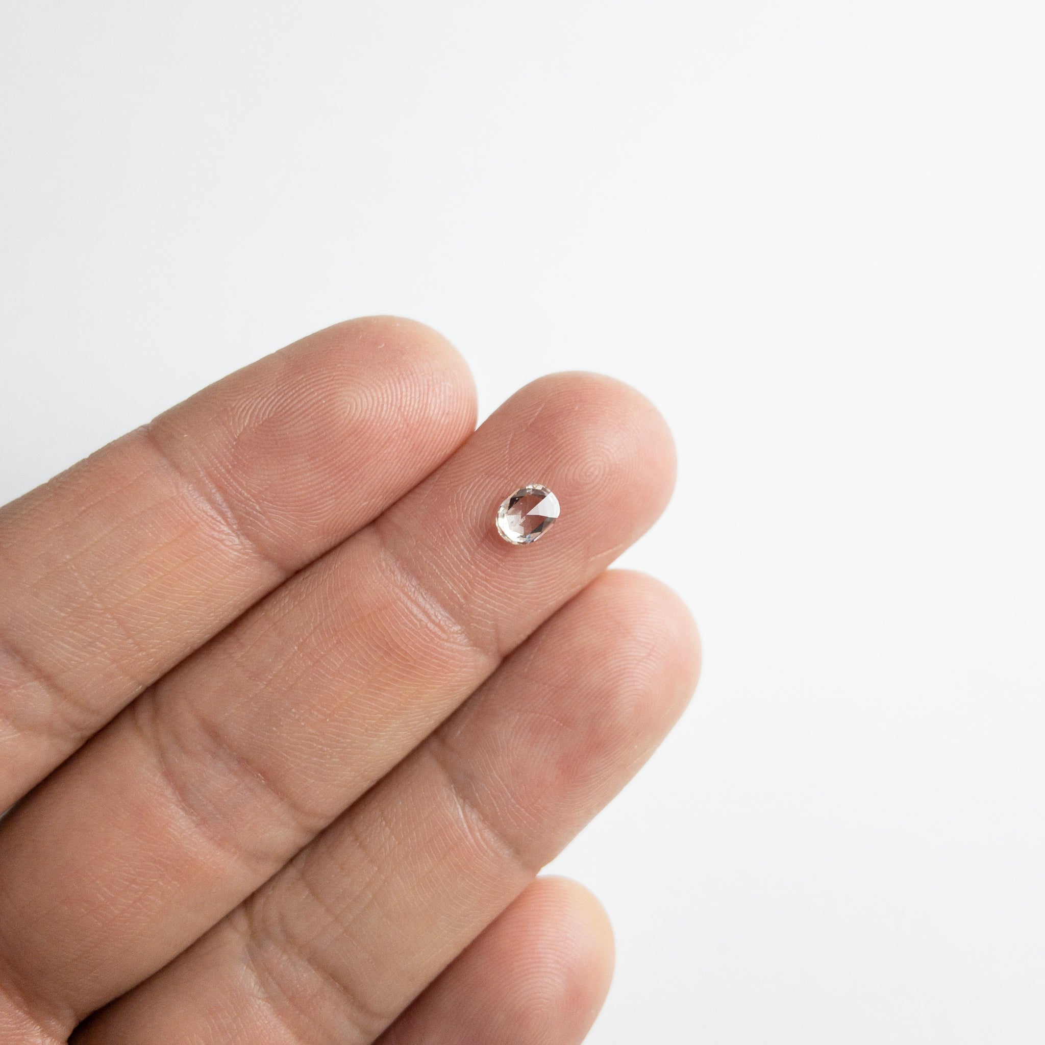 0.55ct 5.61x4.45x2.20mm VS2 I/J Oval Rosecut 18107-01 - Misfit Diamonds