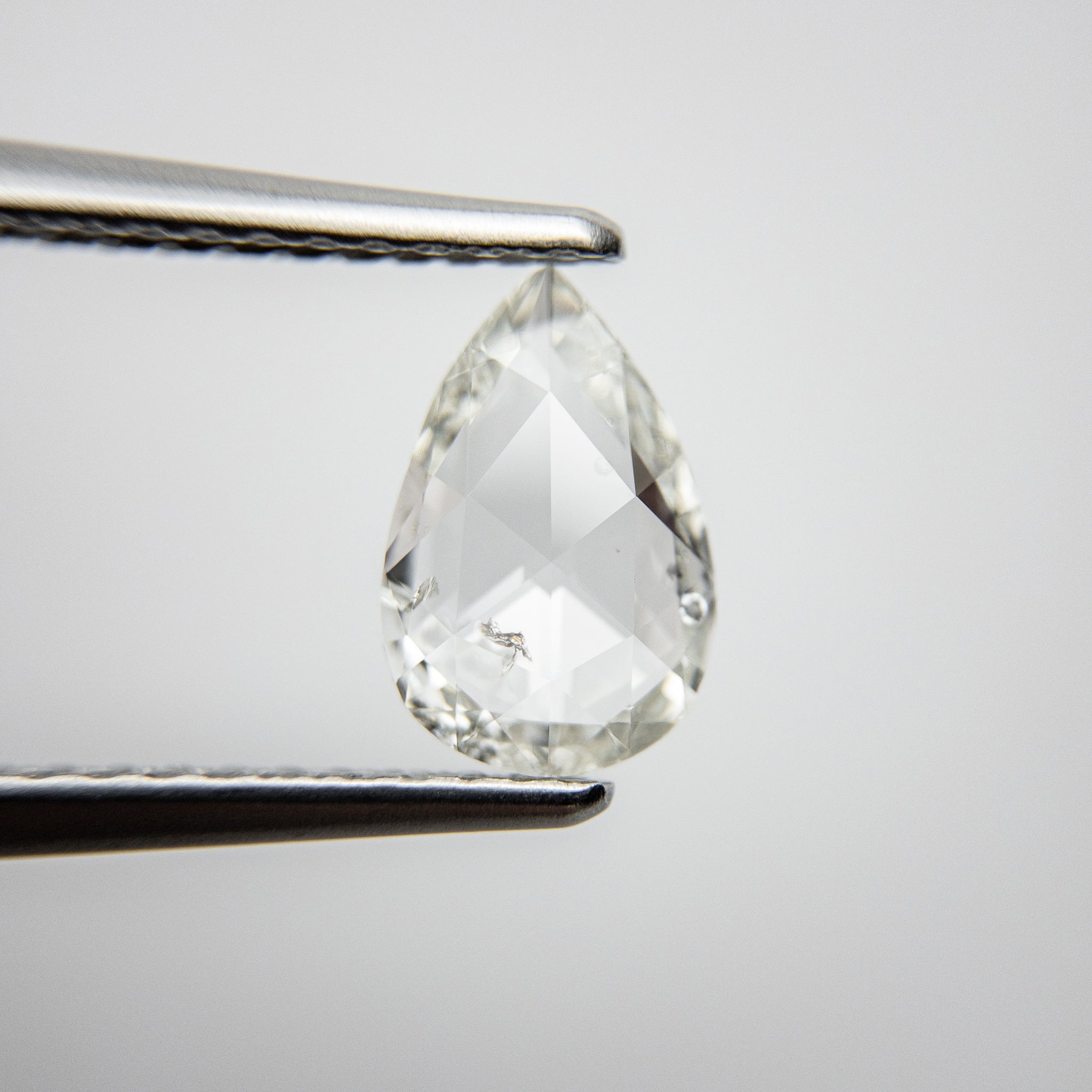 0.63ct 8.59x5.69x1.73mm I1 I/J Pear Rosecut 18111-01 - Misfit Diamonds