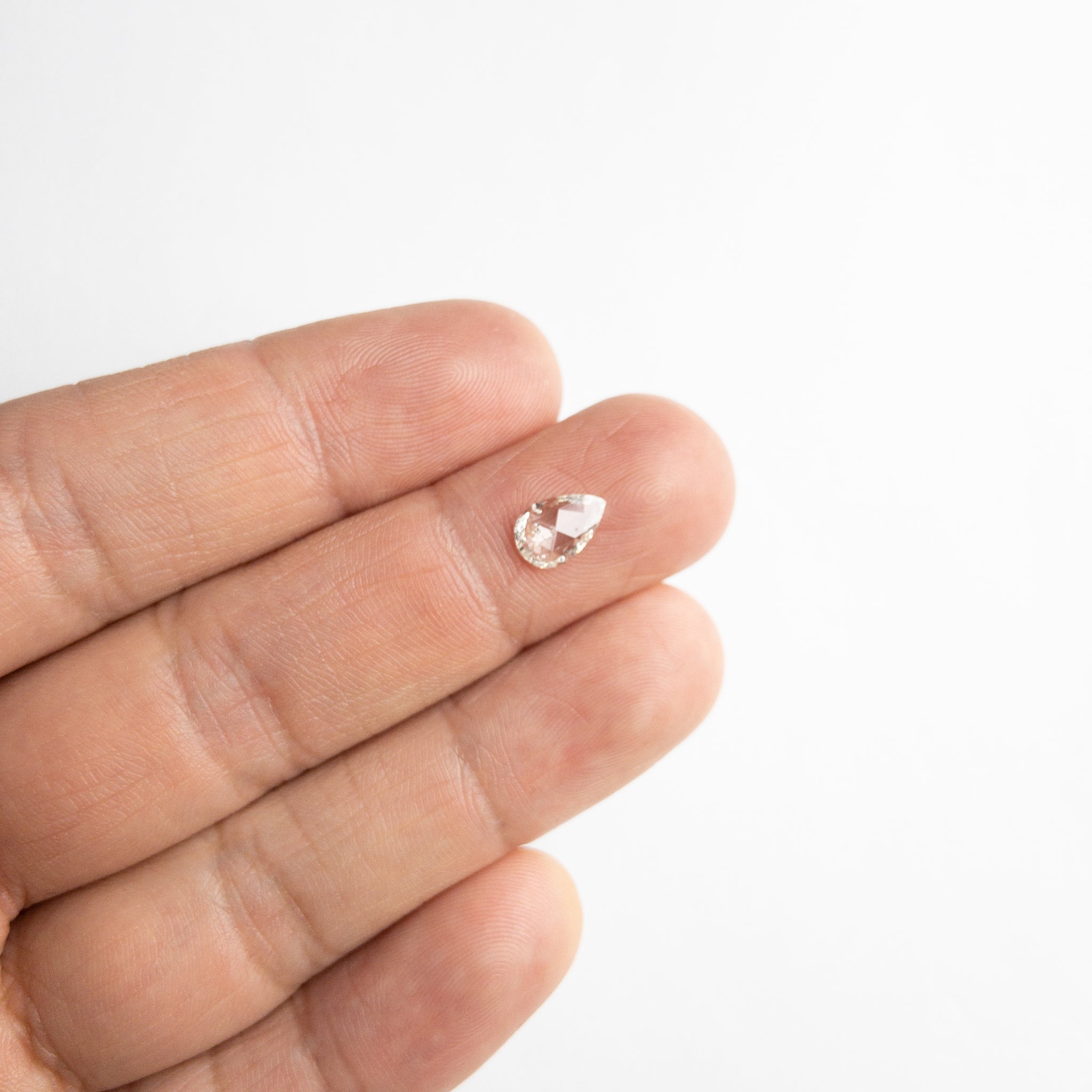 0.63ct 8.59x5.69x1.73mm I1 I/J Pear Rosecut 18111-01 - Misfit Diamonds