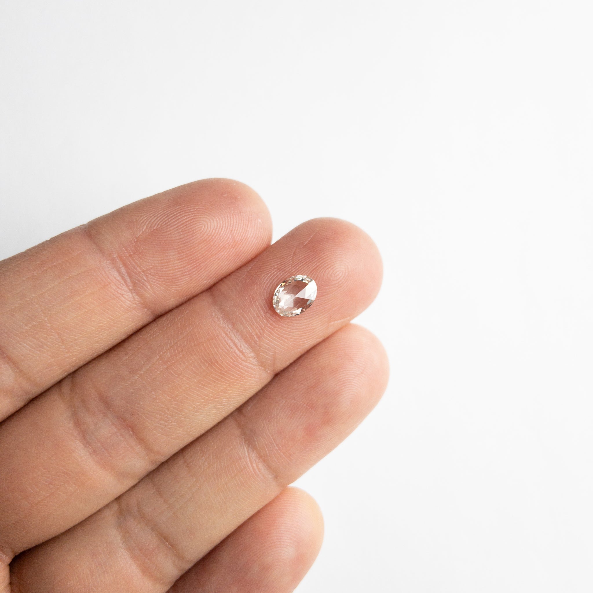 0.59ct 7.17x5.45x1.80mm SI2+ G Oval Rosecut 18111-03 - Misfit Diamonds