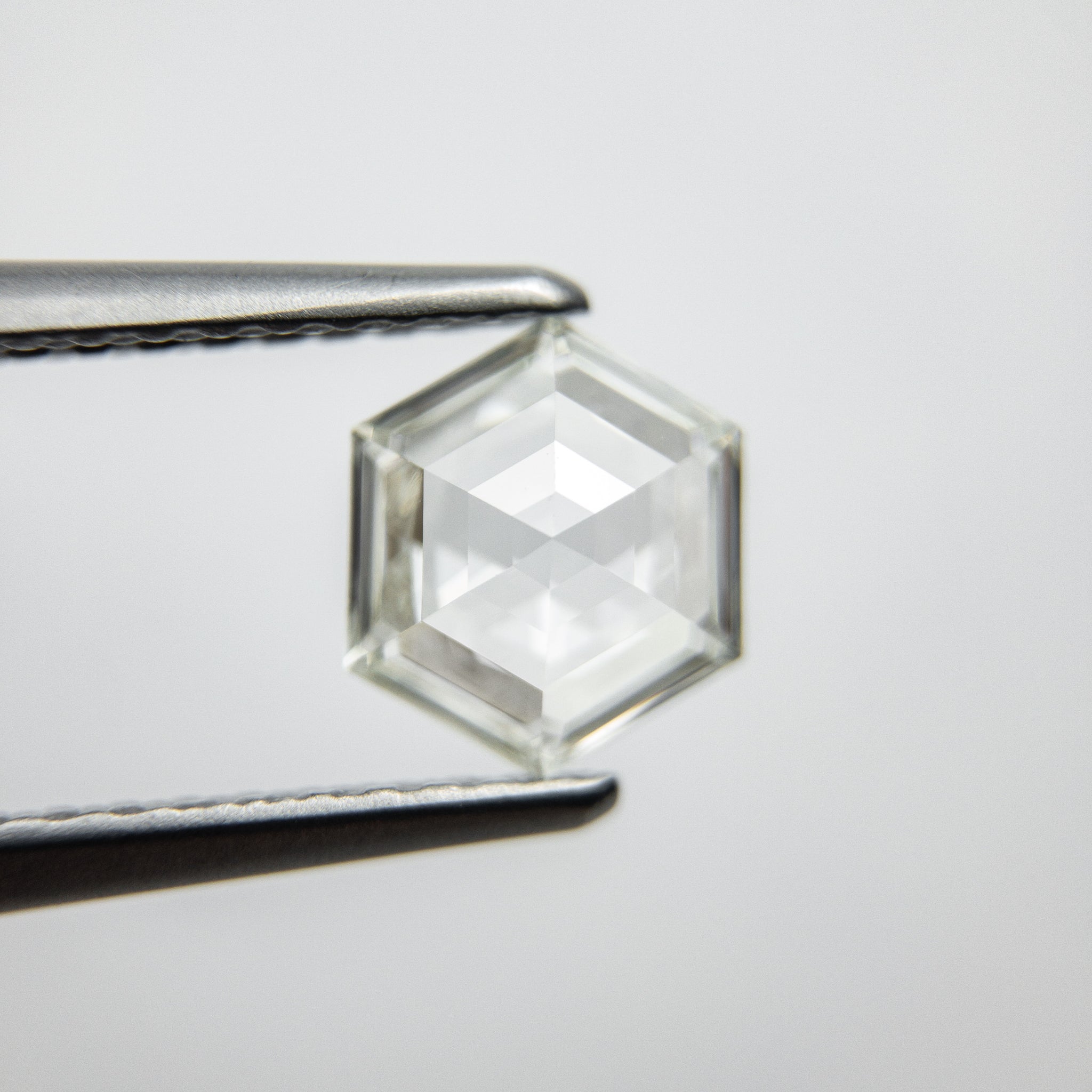 0.77ct 6.86x5.84x2.69mm VS1/VS2 J Hexagon Step Cut 18129-03 - Misfit Diamonds