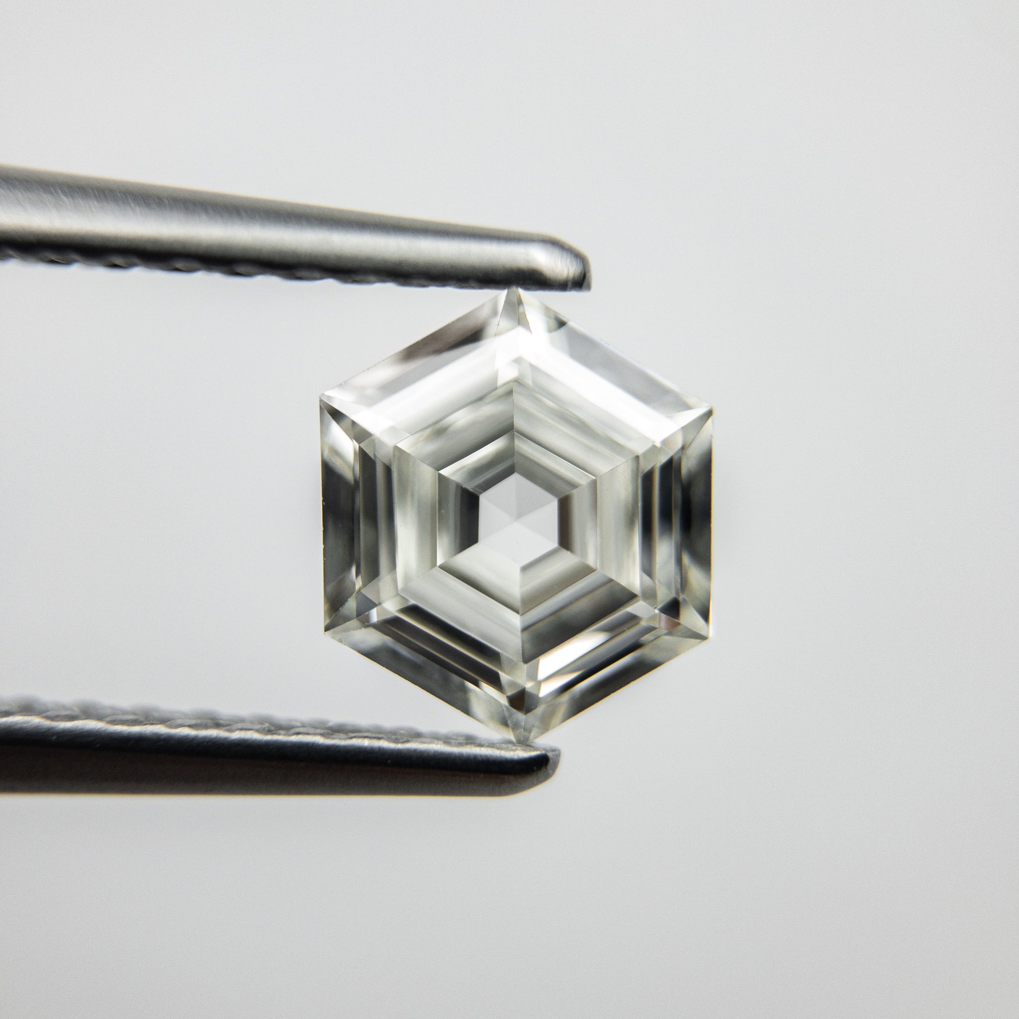 0.77ct 6.86x5.84x2.69mm VS1/VS2 J Hexagon Step Cut 18129-03 - Misfit Diamonds