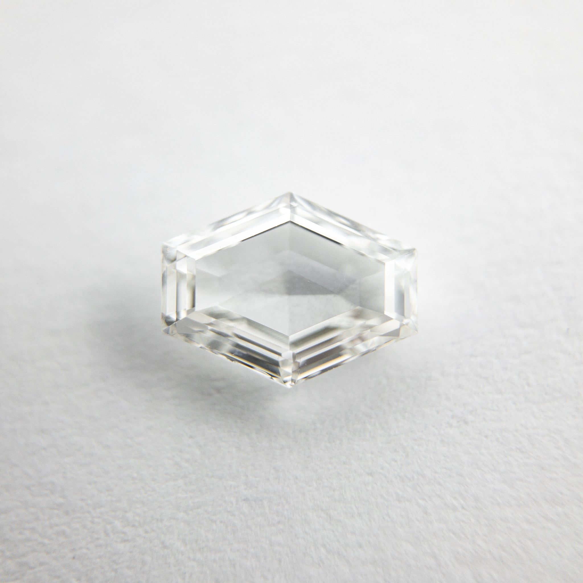 0.72ct 7.02x5.45x2.27mm Hexagon Step Cut 18129-06 - Misfit Diamonds