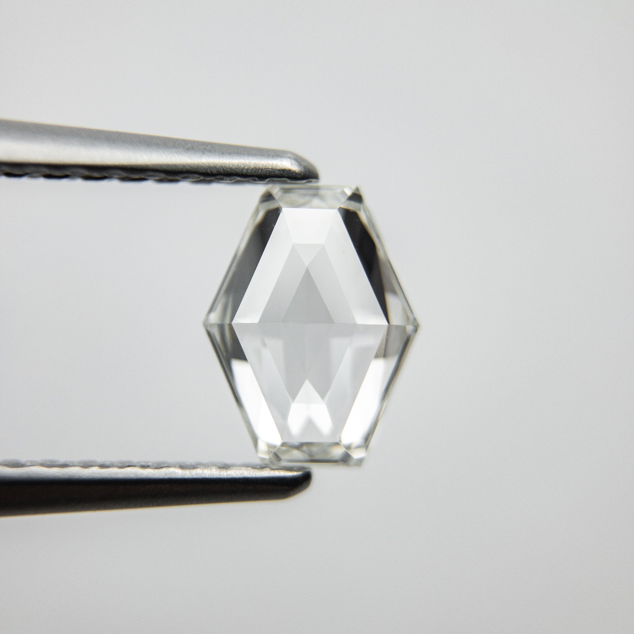 0.72ct 7.02x5.45x2.27mm Hexagon Step Cut 18129-06 - Misfit Diamonds