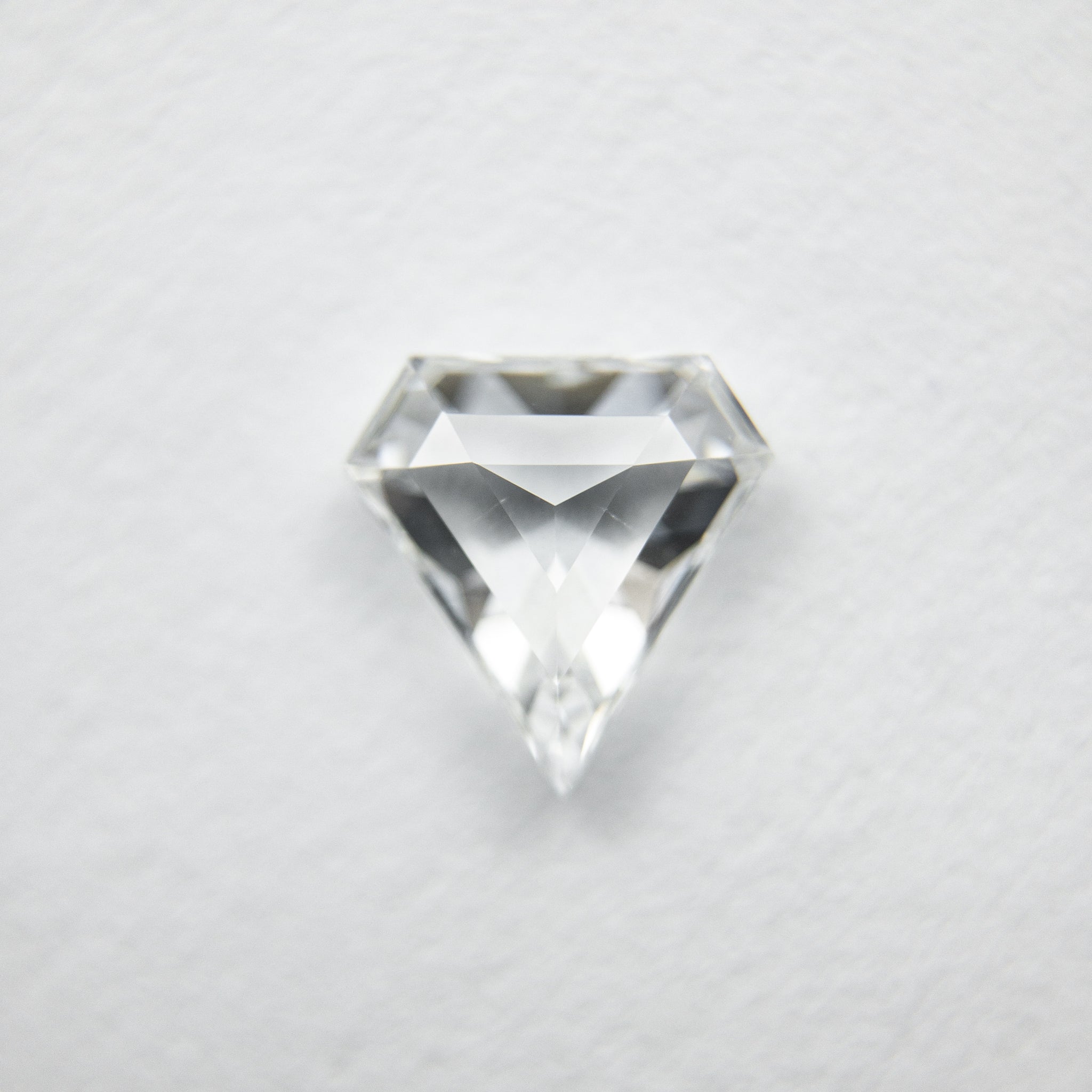 0.64ct 6.57x6.44x2.34mm Shield Step Cut 18129-09 - Misfit Diamonds