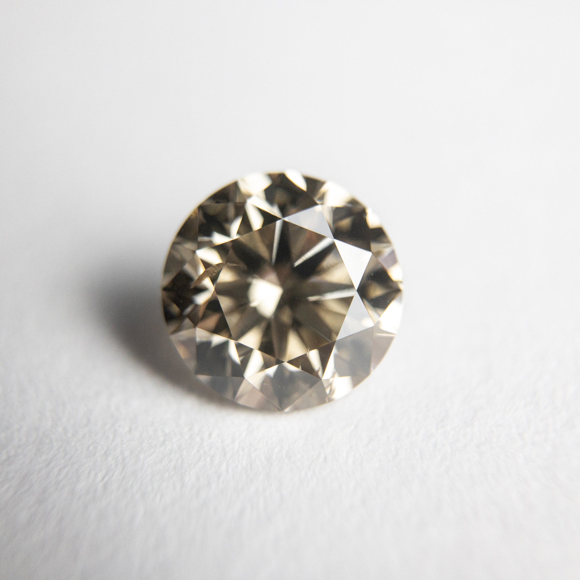 1.35ct 6.91x6.88x4.41mm SI2 Champagne Round Brilliant 18305-03 - Misfit Diamonds