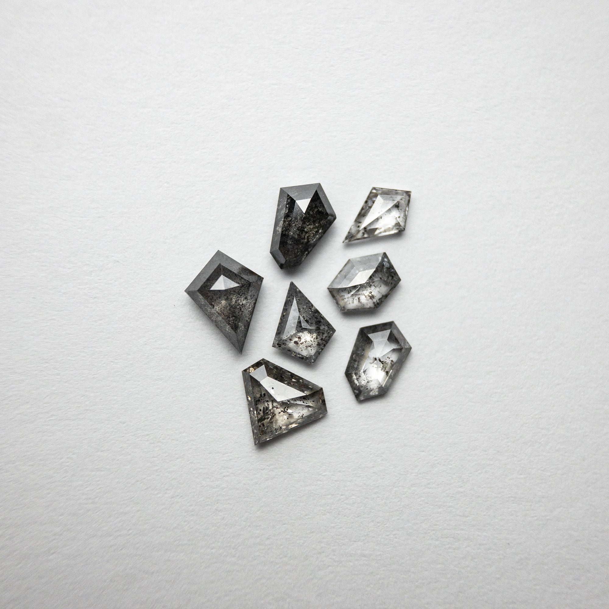 7pcs 1.92cttw 6.60-4.28mm Assorted Shape Melee 18429-06 - Misfit Diamonds