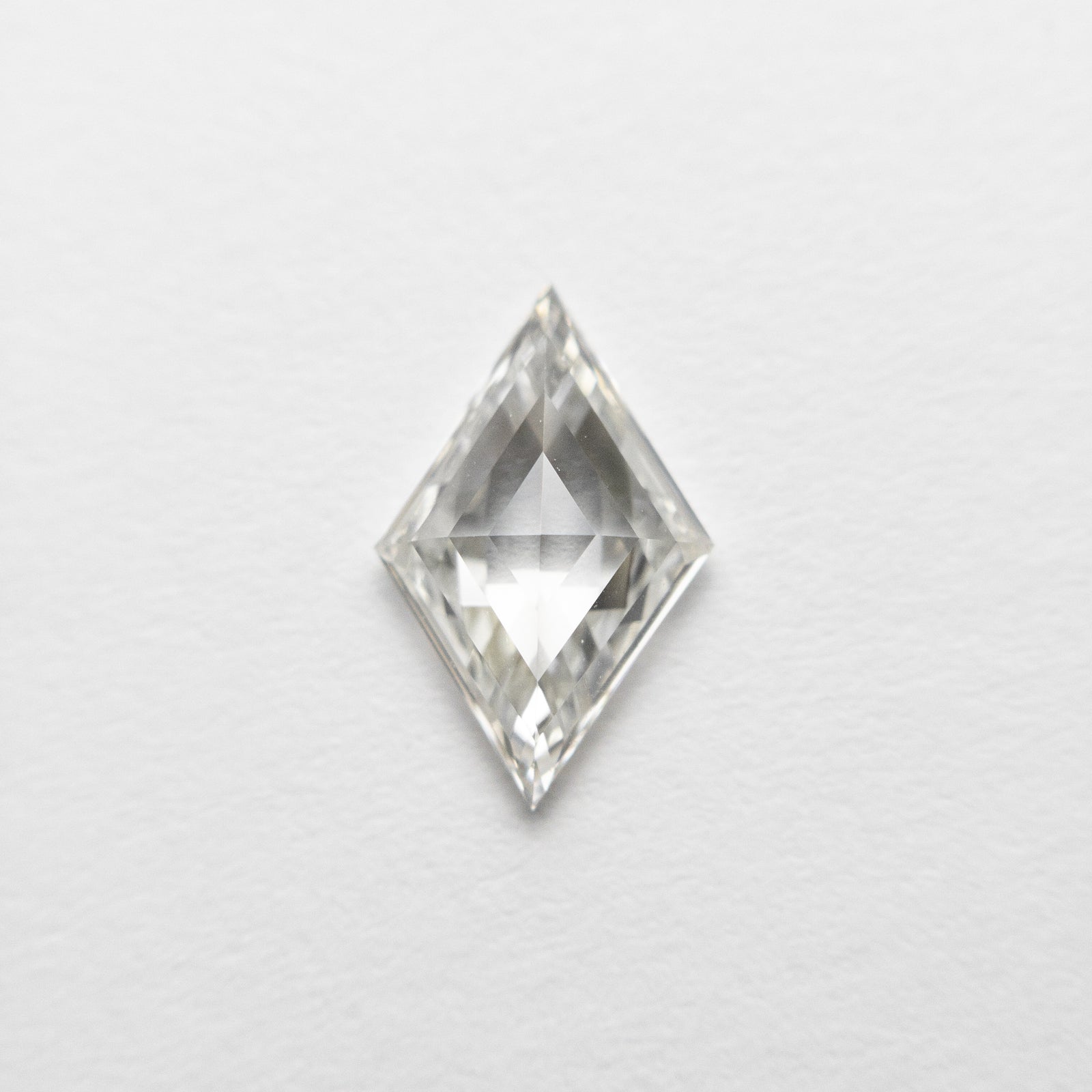 0.64ct 9.22x5.90x2.29mm VS1 L-M Lozenge Step Cut 18470-04 - Misfit Diamonds