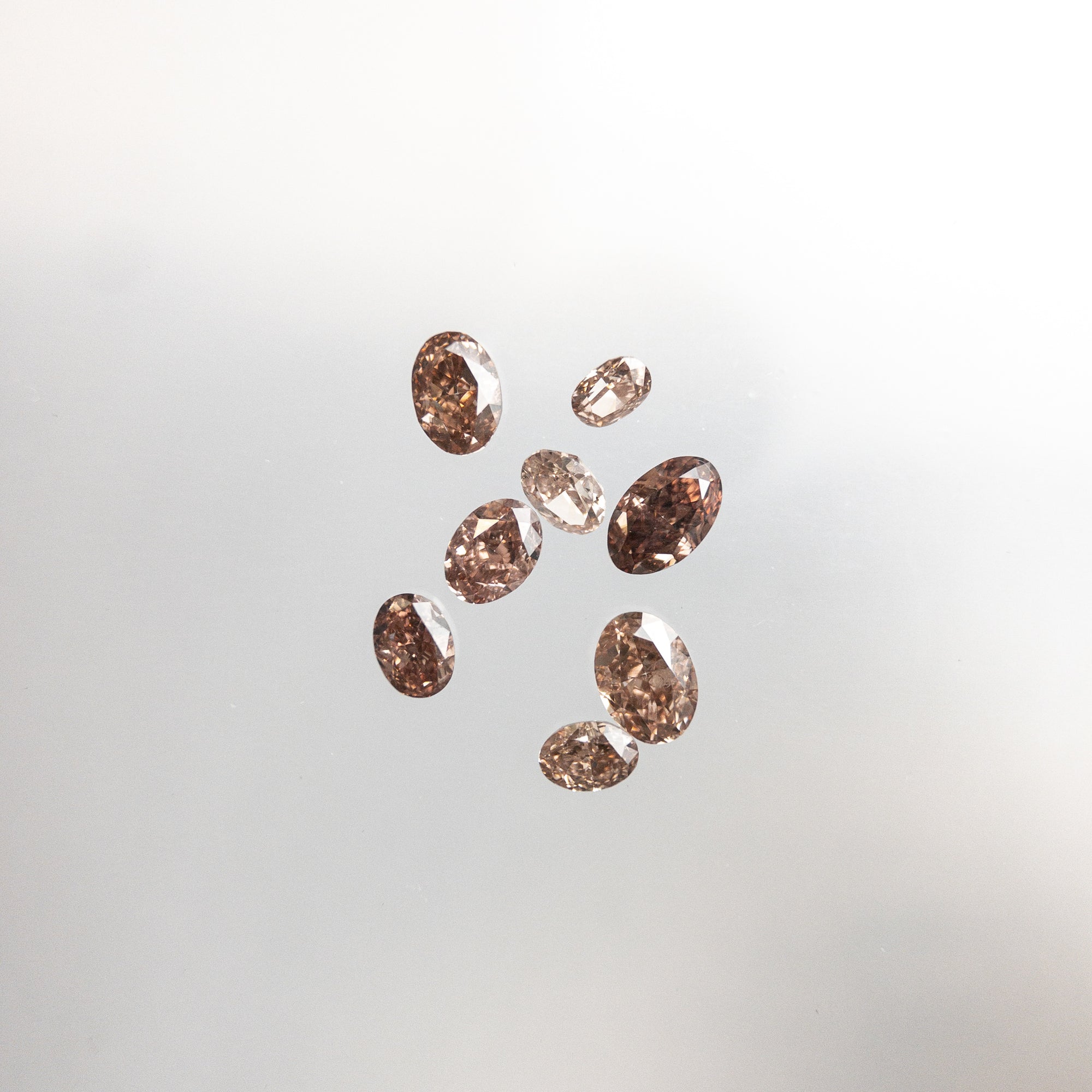 8pc 1.03cttw 4.18-2.62mm Argyle Champagne Pink Oval Brilliant Melee 18519-03 - Misfit Diamonds