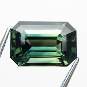 10.60ct 14.13x9.70x7.56mm Cut Corner Rectangle Step Cut Sapphire 18972-01 - Misfit Diamonds