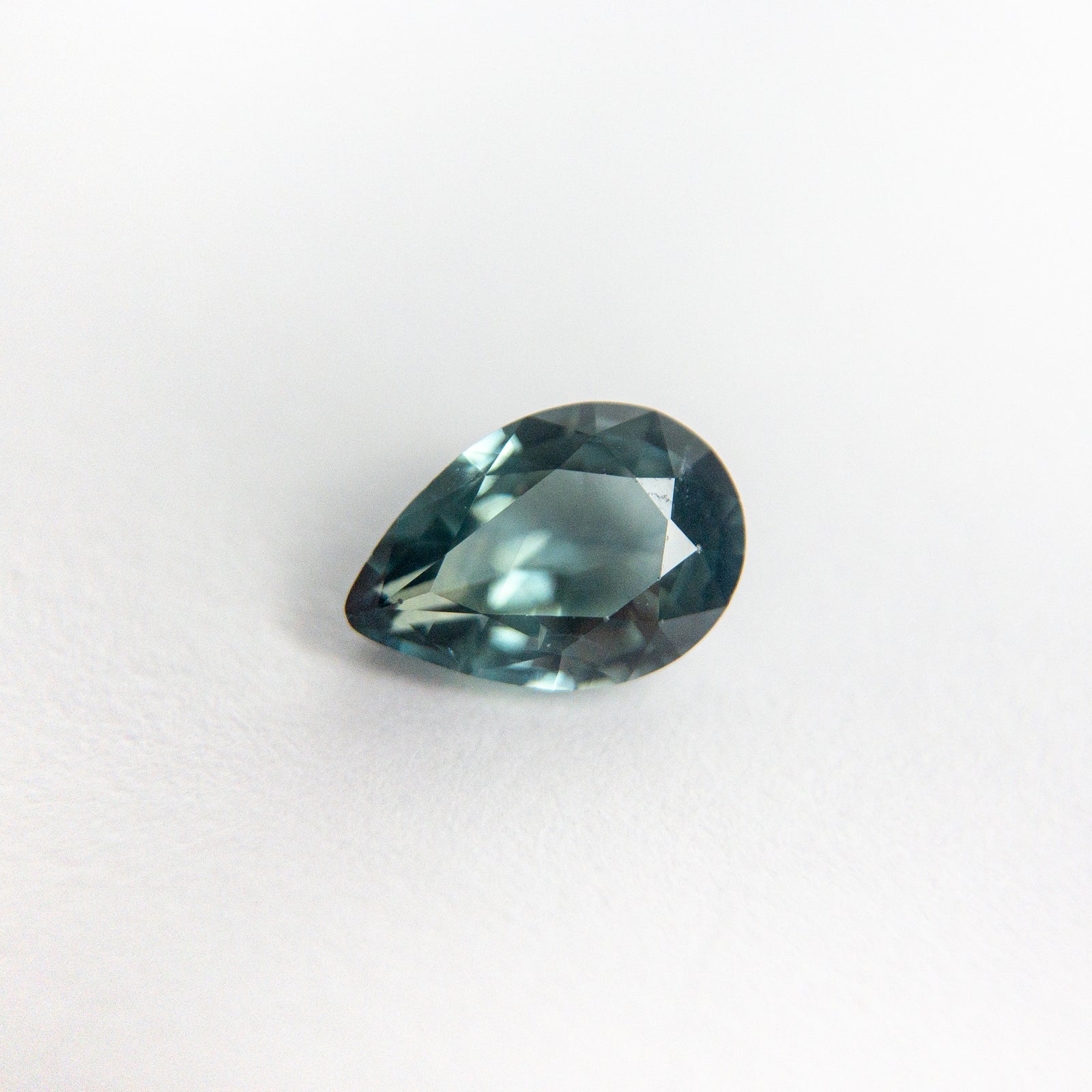 0.63ct 6.49x4.50x2.65mm Pear Brilliant Sapphire 18973-14 - Misfit Diamonds