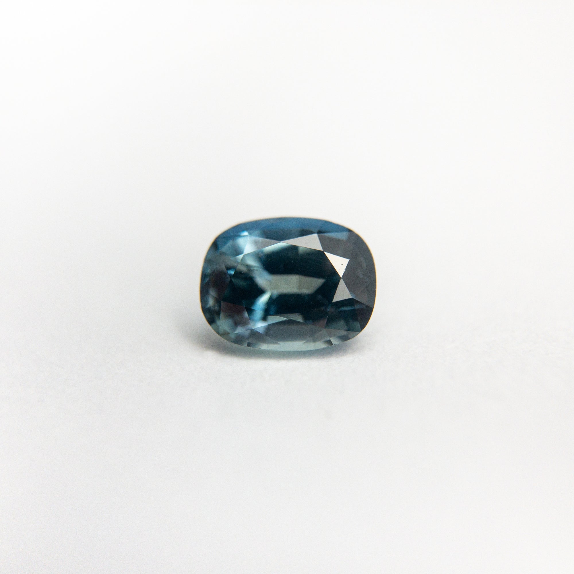 0.61ct 5.41x4.20x3.10mm Cushion Brilliant Sapphire 18973-30 - Misfit Diamonds