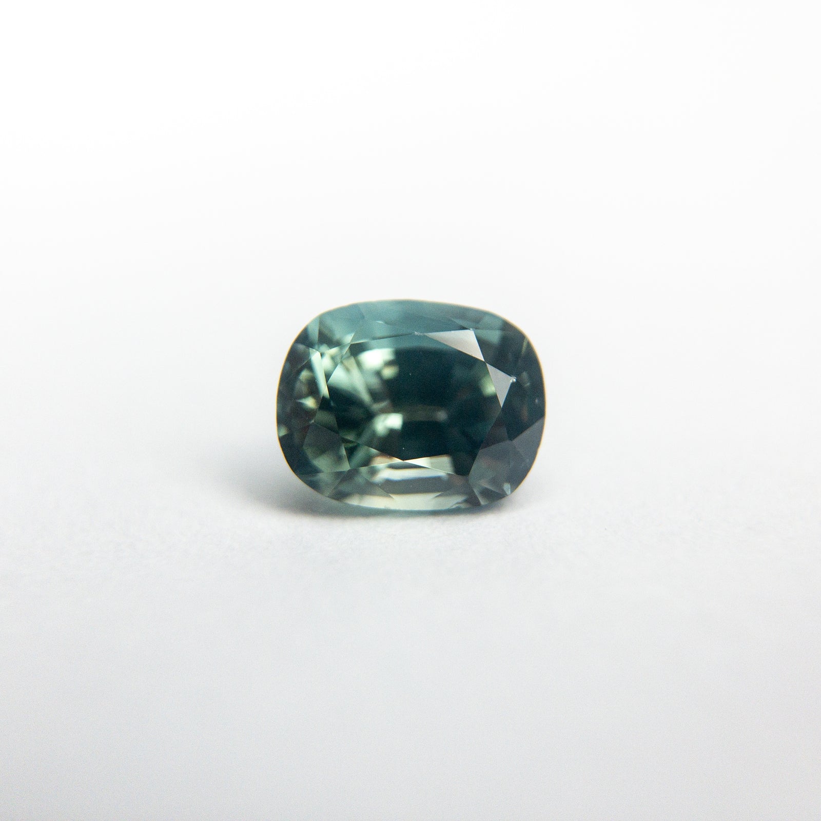 0.79ct 5.72x4.50x3.50mm Cushion Brilliant Sapphire 18973-36 - Misfit Diamonds