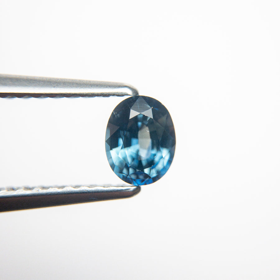 0.60ct 5.45x4.35x3.11mm Oval Brilliant Sapphire 18973-37 - Misfit Diamonds