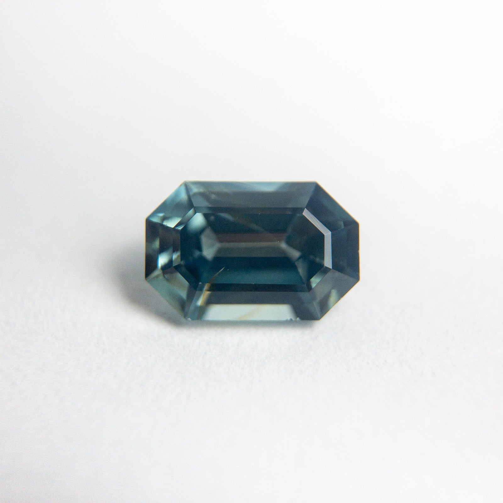 1.12ct 7.28x4.78x3.35mm Cut Corner Rectangle Step Cut Sapphire 18973-39 - Misfit Diamonds