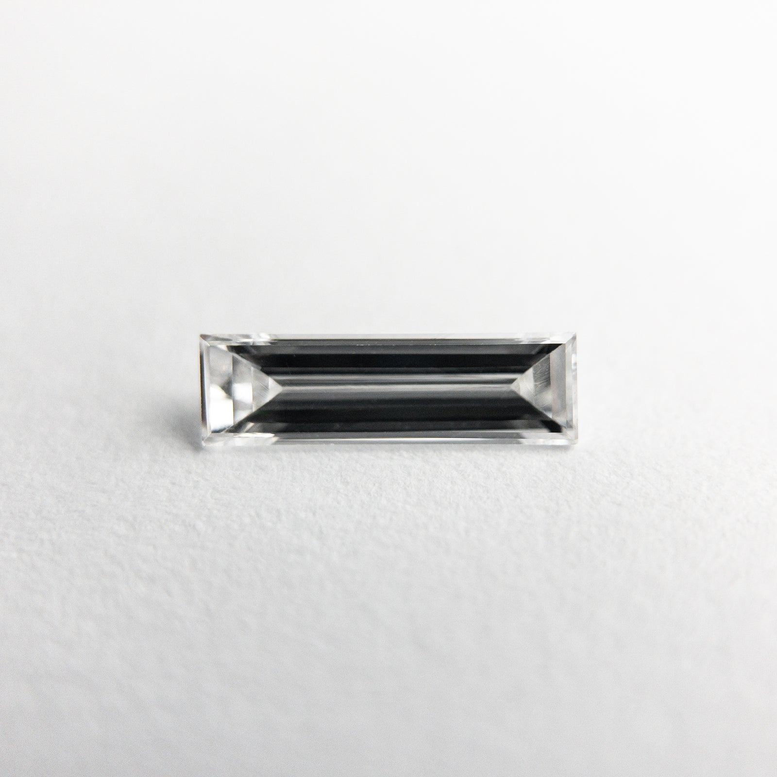 0.28ct 8.04x2.39x1.44mm Baguette Step Cut 19010-04 - Misfit Diamonds