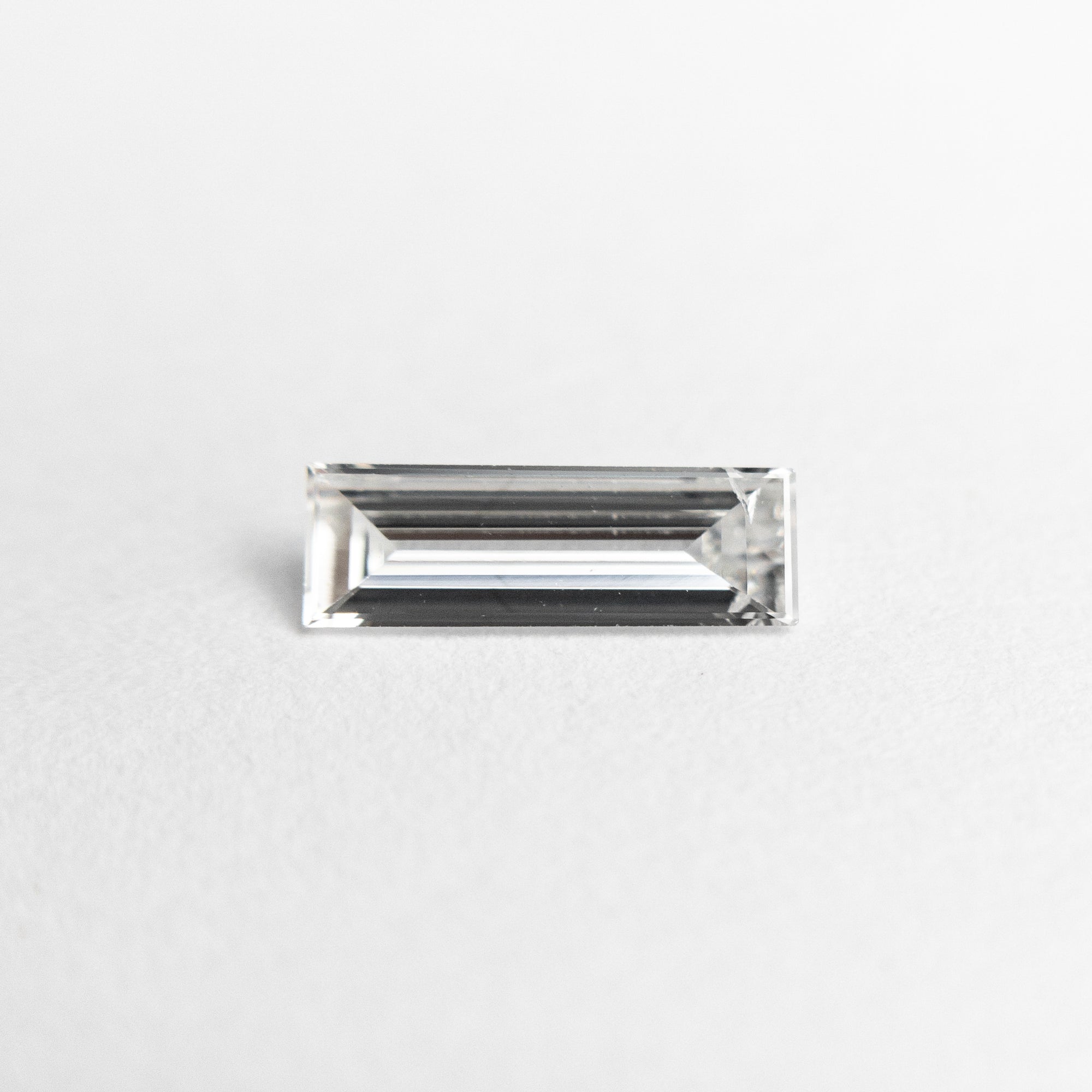 0.28ct 8.20x2.75x1.32mm Baguette Step Cut 19010-07 - Misfit Diamonds