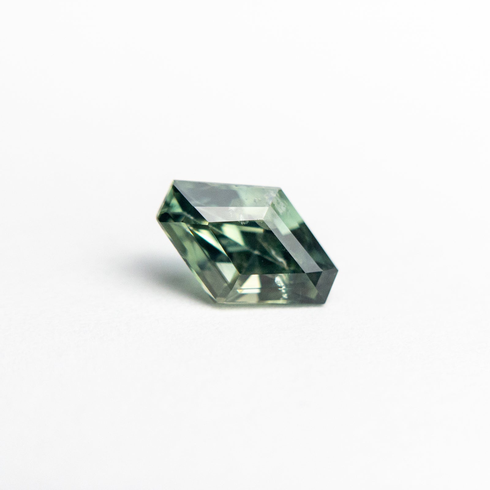 0.91ct 7.39x5.15x3.81mm Hexagon Step Cut Sapphire 19042-12 - Misfit Diamonds
