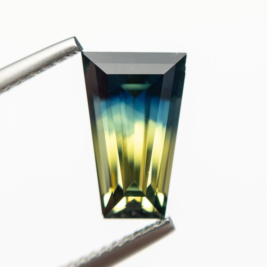 3.25ct 11.48x7.40x4.80mm Tapered Baguette Step Cut Sapphire 19147-04 - Misfit Diamonds