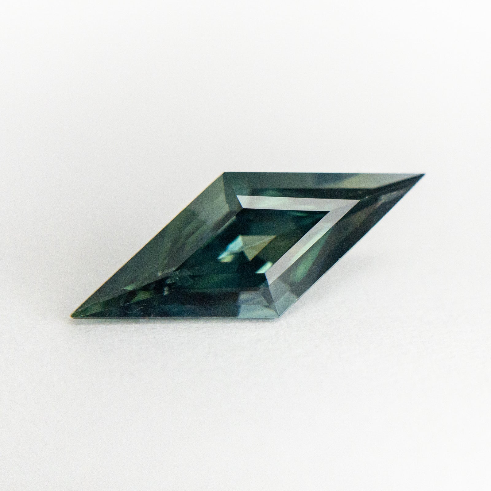 1.70ct 14.45x5.84x4.09mm Kite Step Cut Sapphire 19284-06