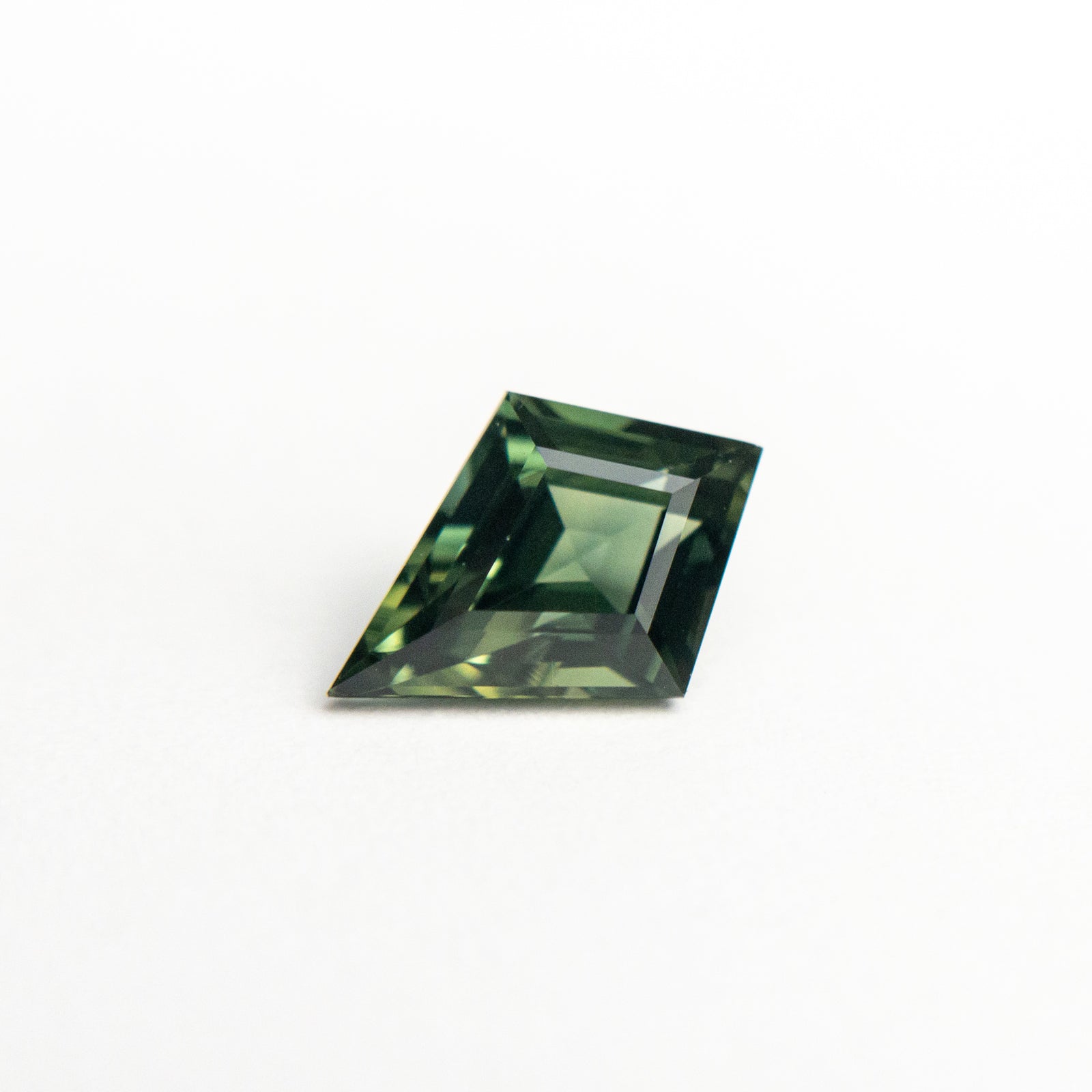 0.90ct 8.47x5.90x3.42mm Kite Step Cut Sapphire 19286-06
