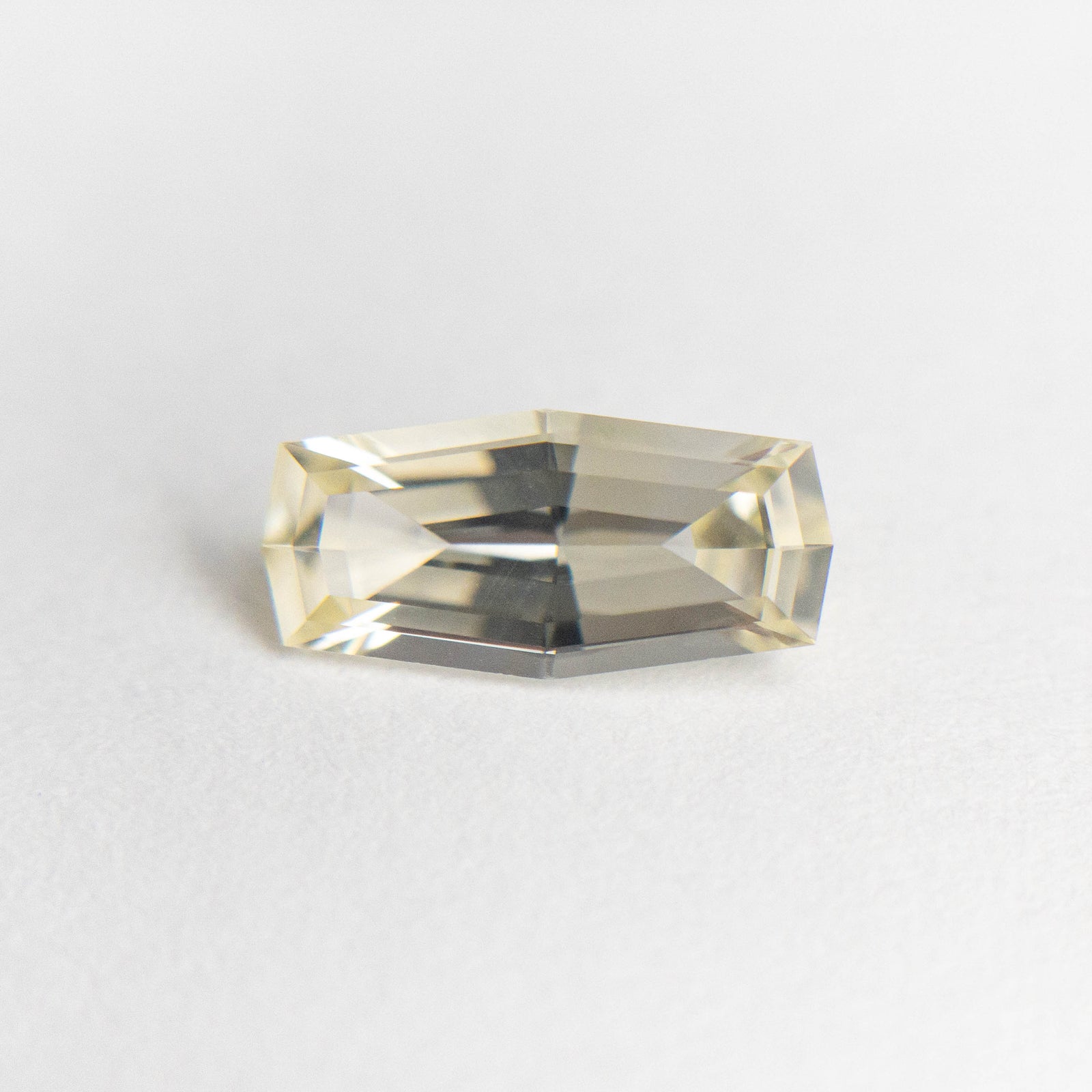 1.04ct 9.46x4.51x2.93mm Geometric Step Cut Sapphire 19385-38