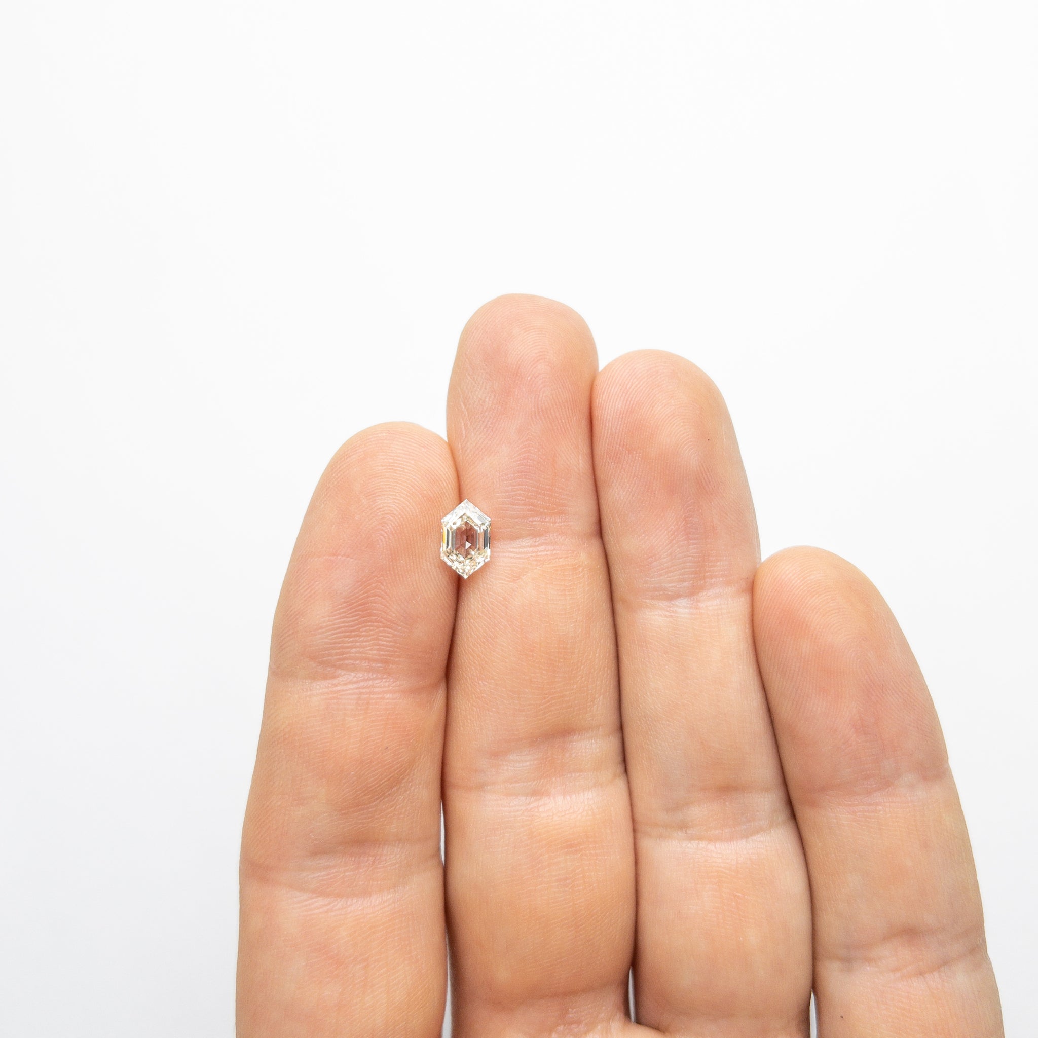 1.06ct 8.42x5.22x2.93mm VS2 N Hexagon Step Cut 19421-01