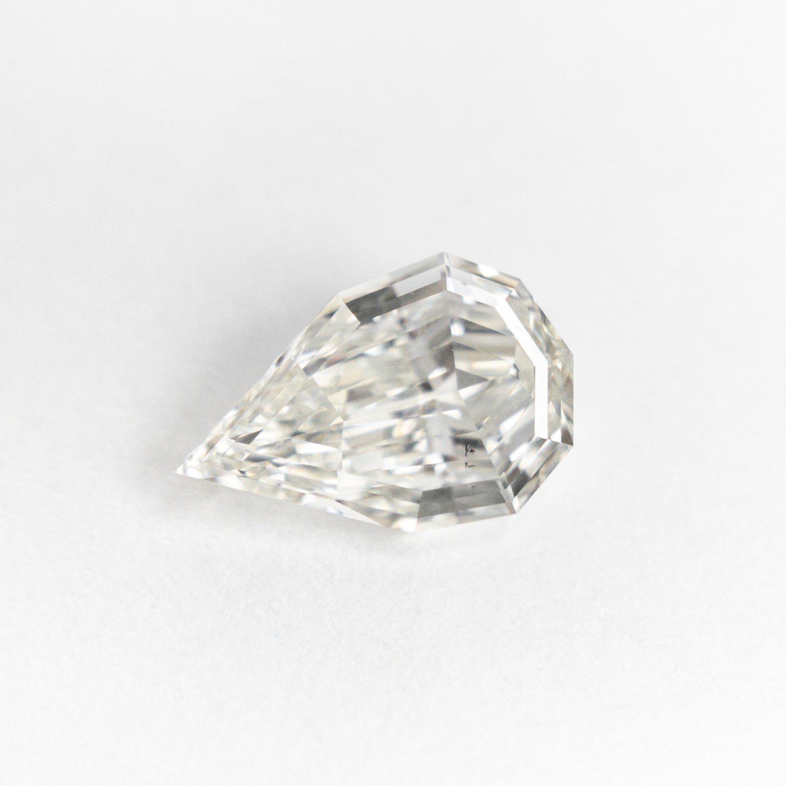 1.24ct 9.51x6.28x2.94mm SI1 H Geo Pear Step Cut 19489-01