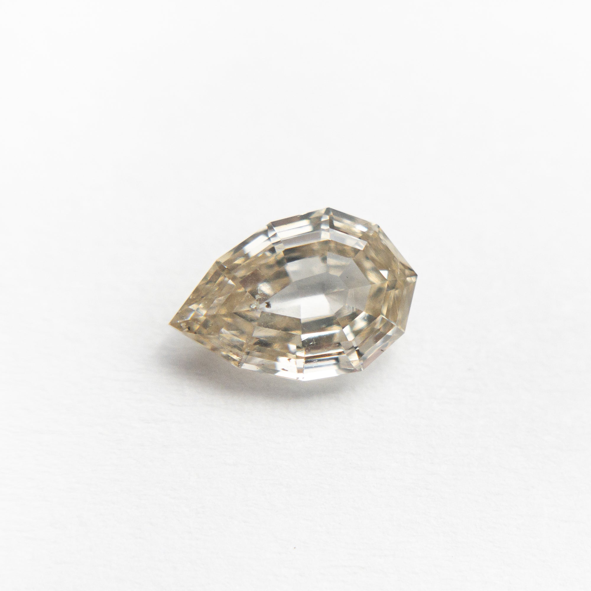 0.76ct 7.65x5.05x2.64mm SI2 C3 Geo Pear Step Cut 19592-02