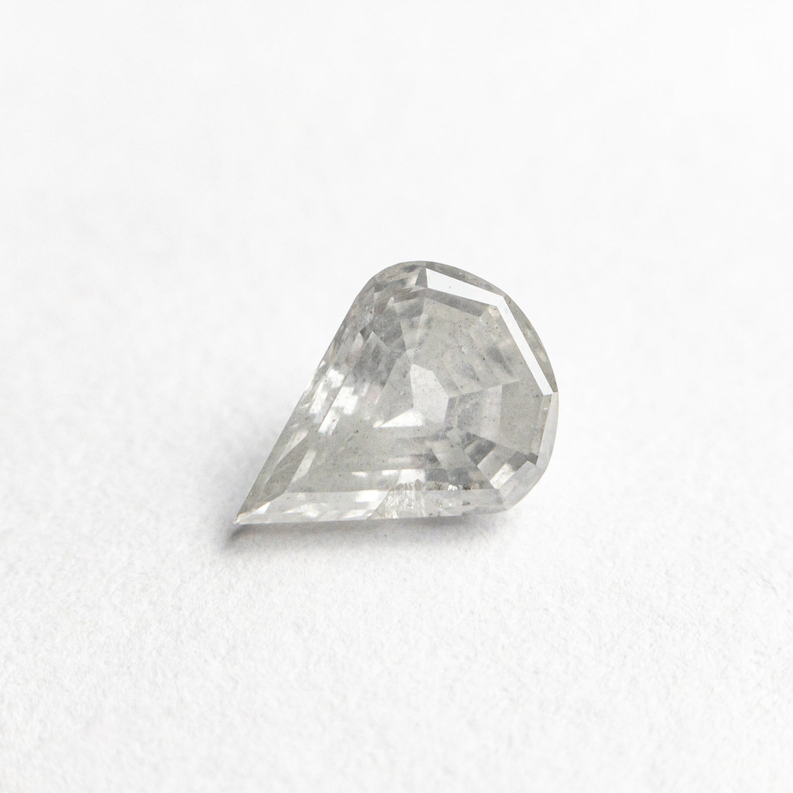 0.63ct 7.09x5.34x2.80mm Pear Step Cut 19609-34