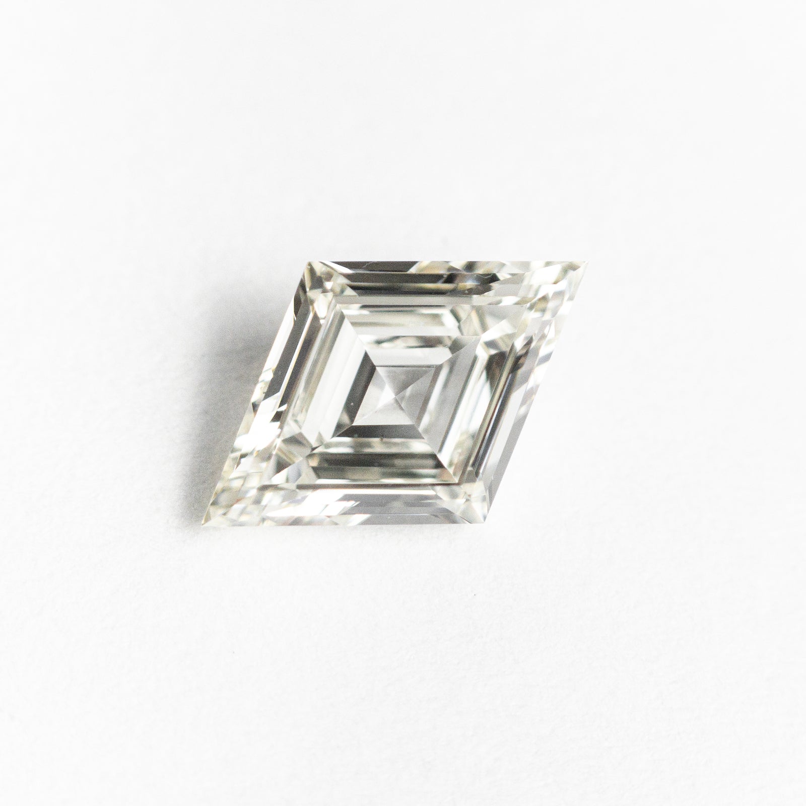 0.71ct 9.17x6.16x2.50mm VS/SI K Lozenge Step Cut 19646-02