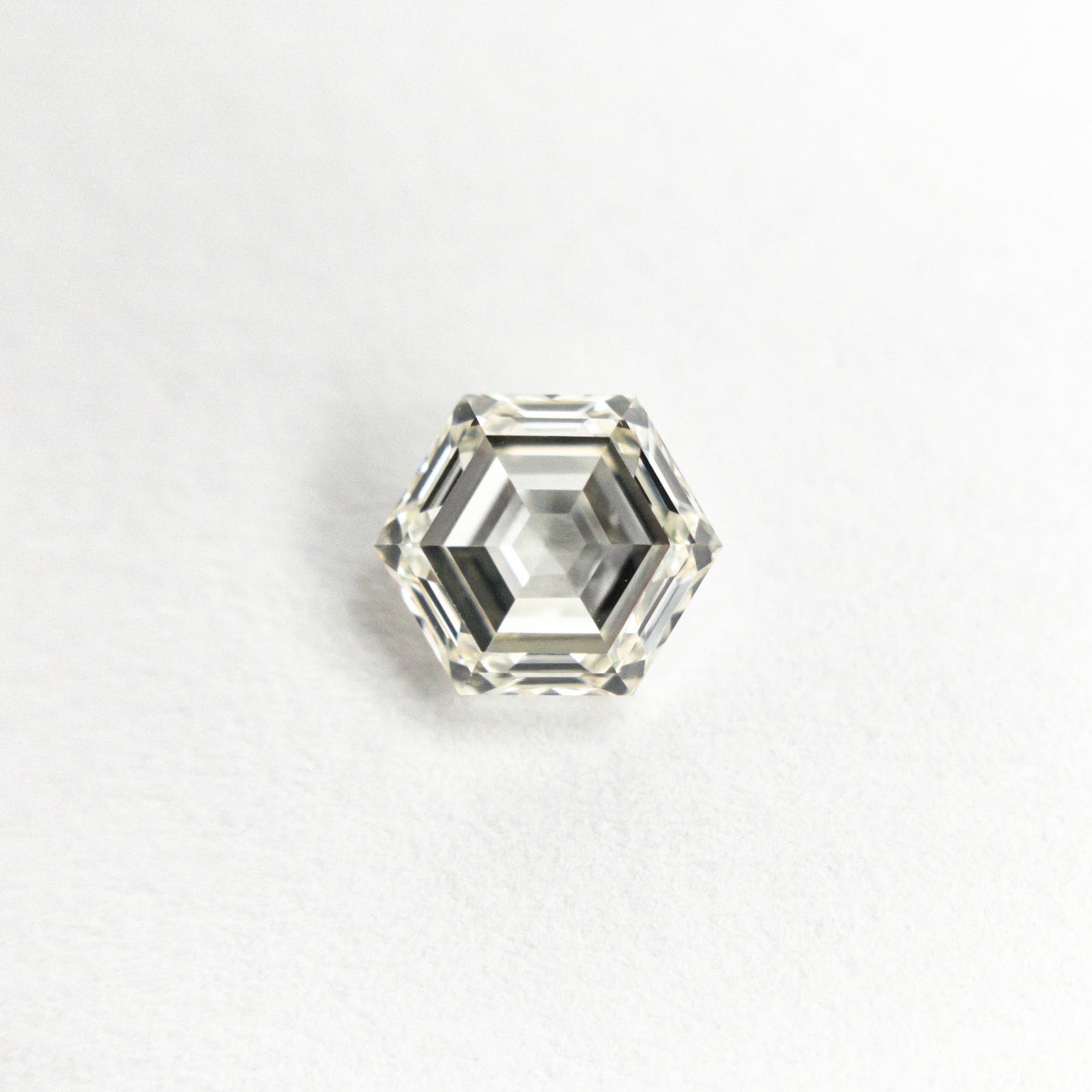 0.60ct 5.73x4.88x2.61mm VS J-K Hexagon Step Cut 19654-01