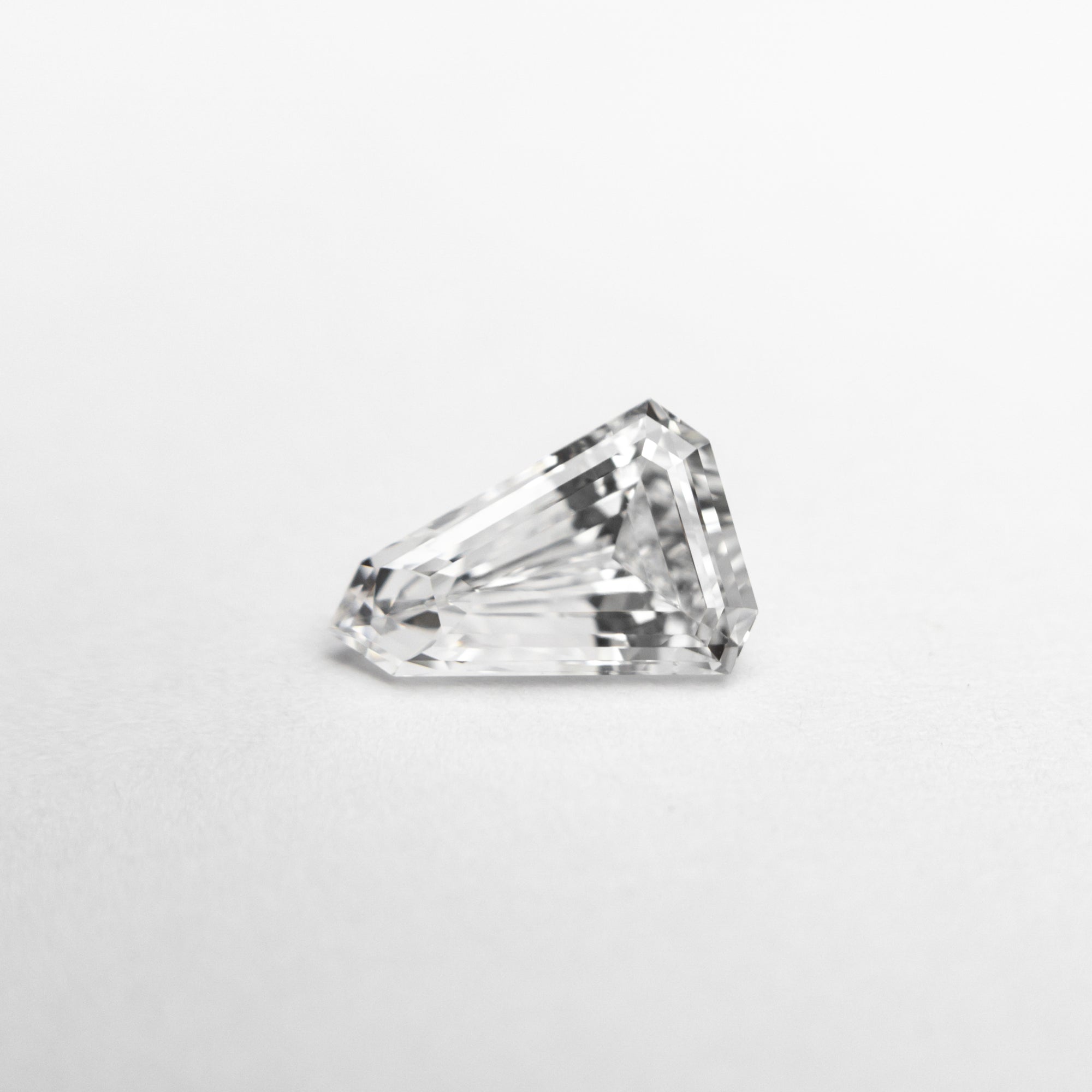 0.55ct 7.10x4.85x2.66mm VS2 F Shield Step Cut 19677-03