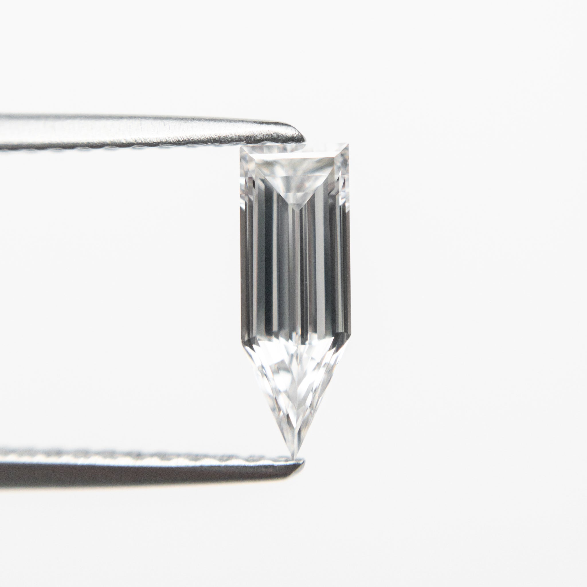 0.53ct 9.51x3.32x2.09mm GIA VVS2 D Pentagon Step Cut 19732-01