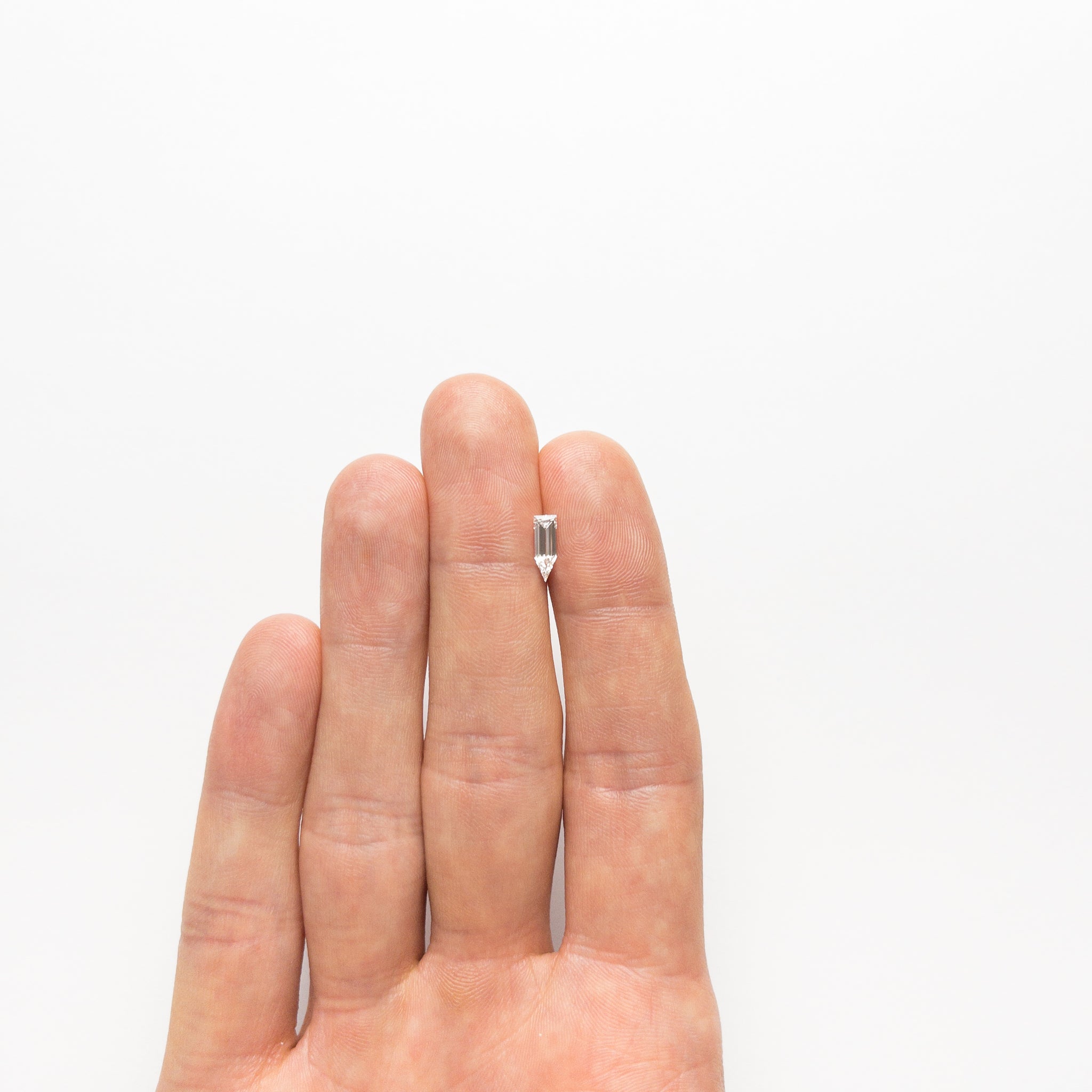 0.53ct 9.51x3.32x2.09mm GIA VVS2 D Pentagon Step Cut 19732-01