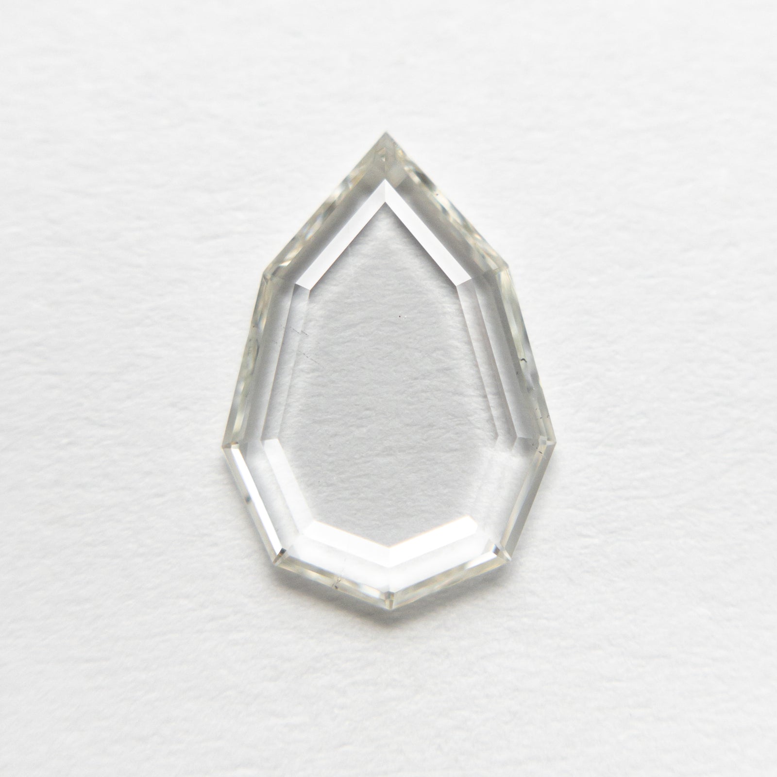 1.04ct 10.76x7.42x1.35mm SI2 K Geo Pear Portrait Cut 19854-12
