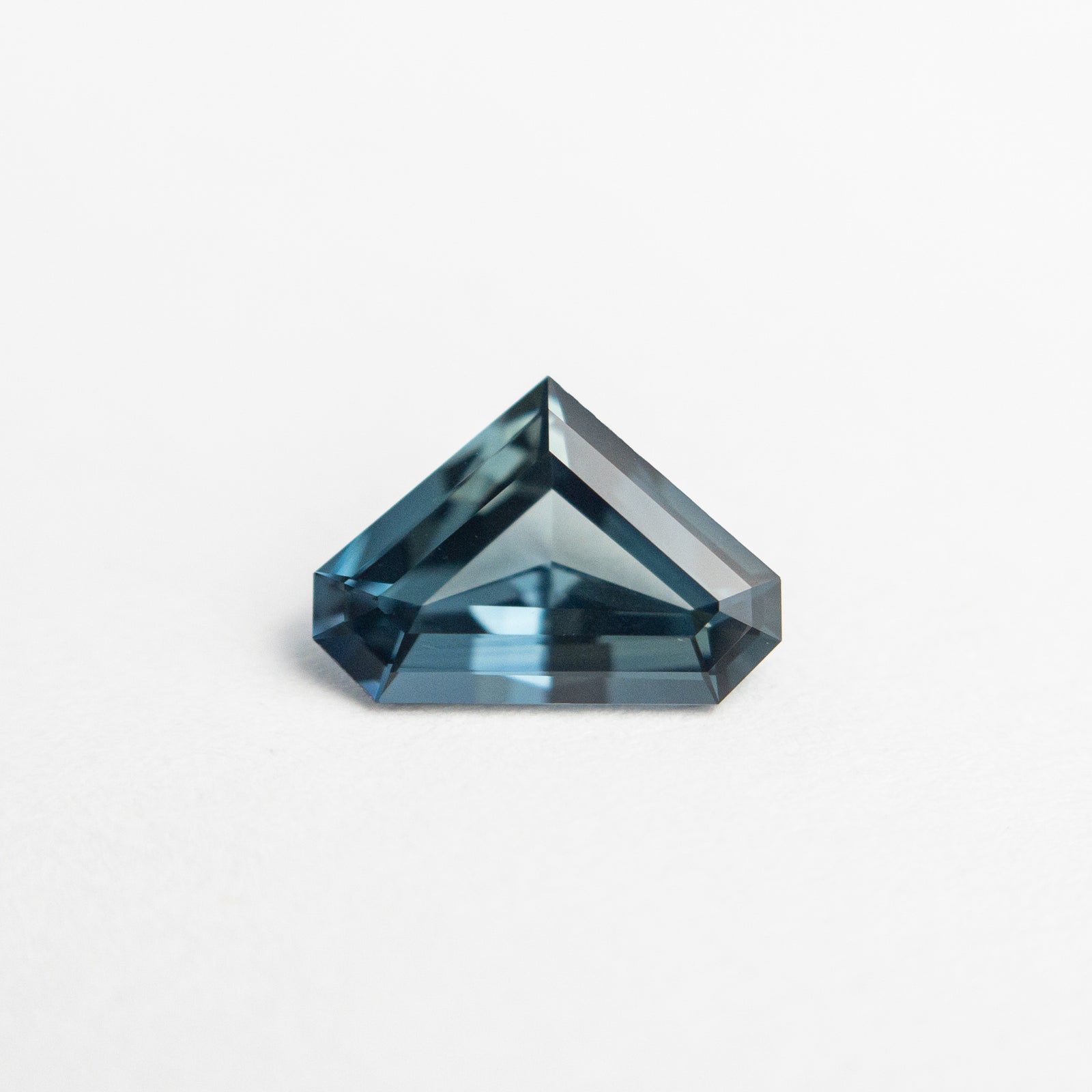0.80ct 7.76x5.48x2.76mm Shield Step Cut Sapphire 20146-01