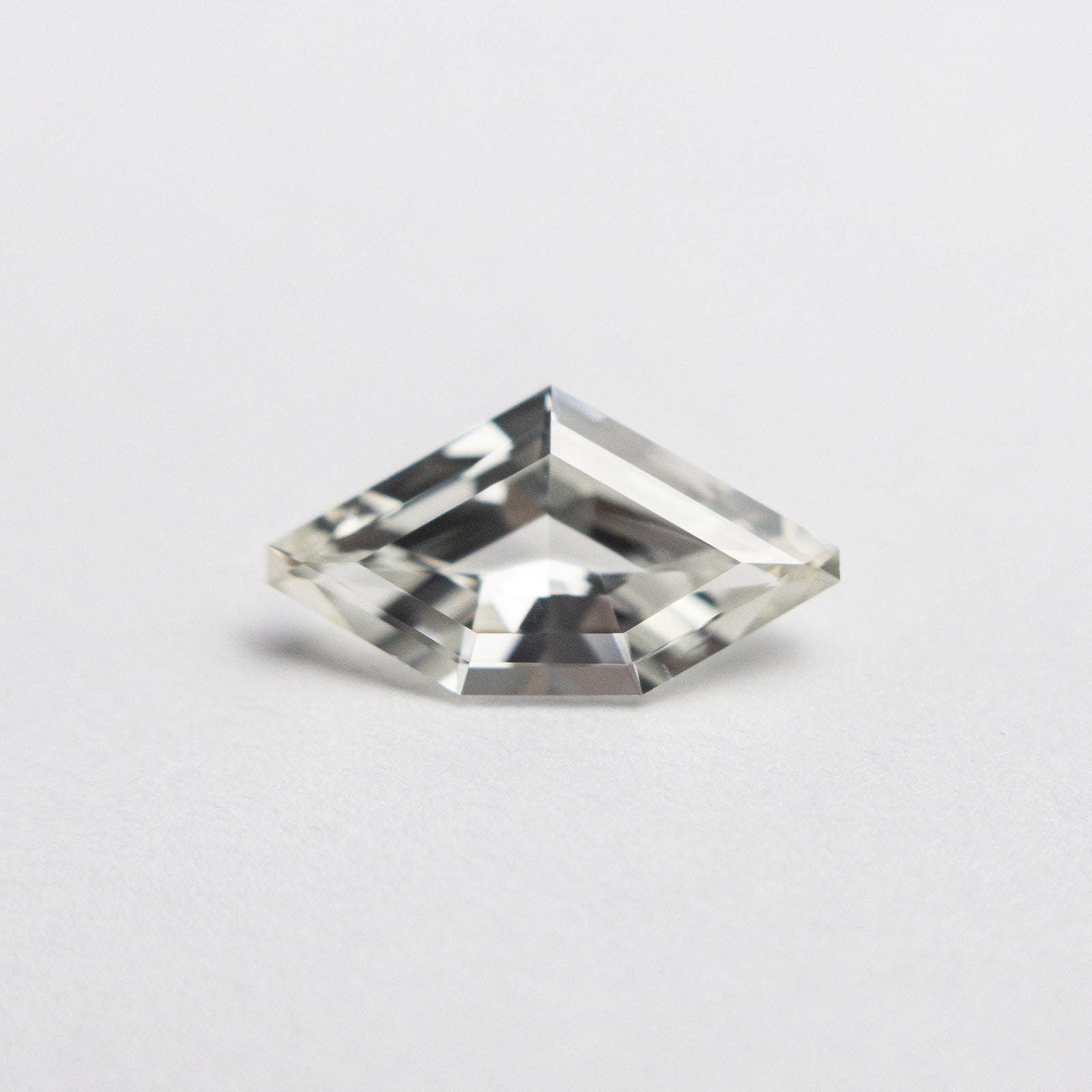 0.77ct 9.24x5.06x2.74mm Shield Step Cut Sapphire 20221-01