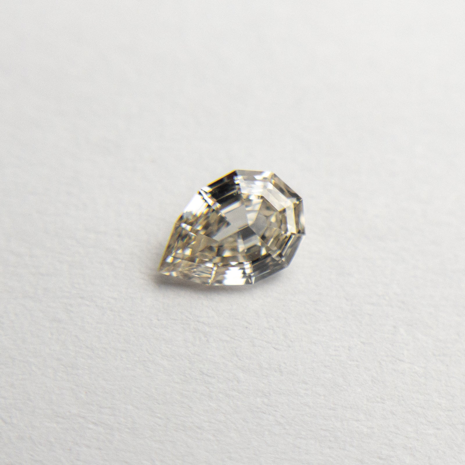 0.28ct 5.51x3.73x1.97mm Geo Pear Step Cut 19163-21 🇨🇦 - Misfit Diamonds