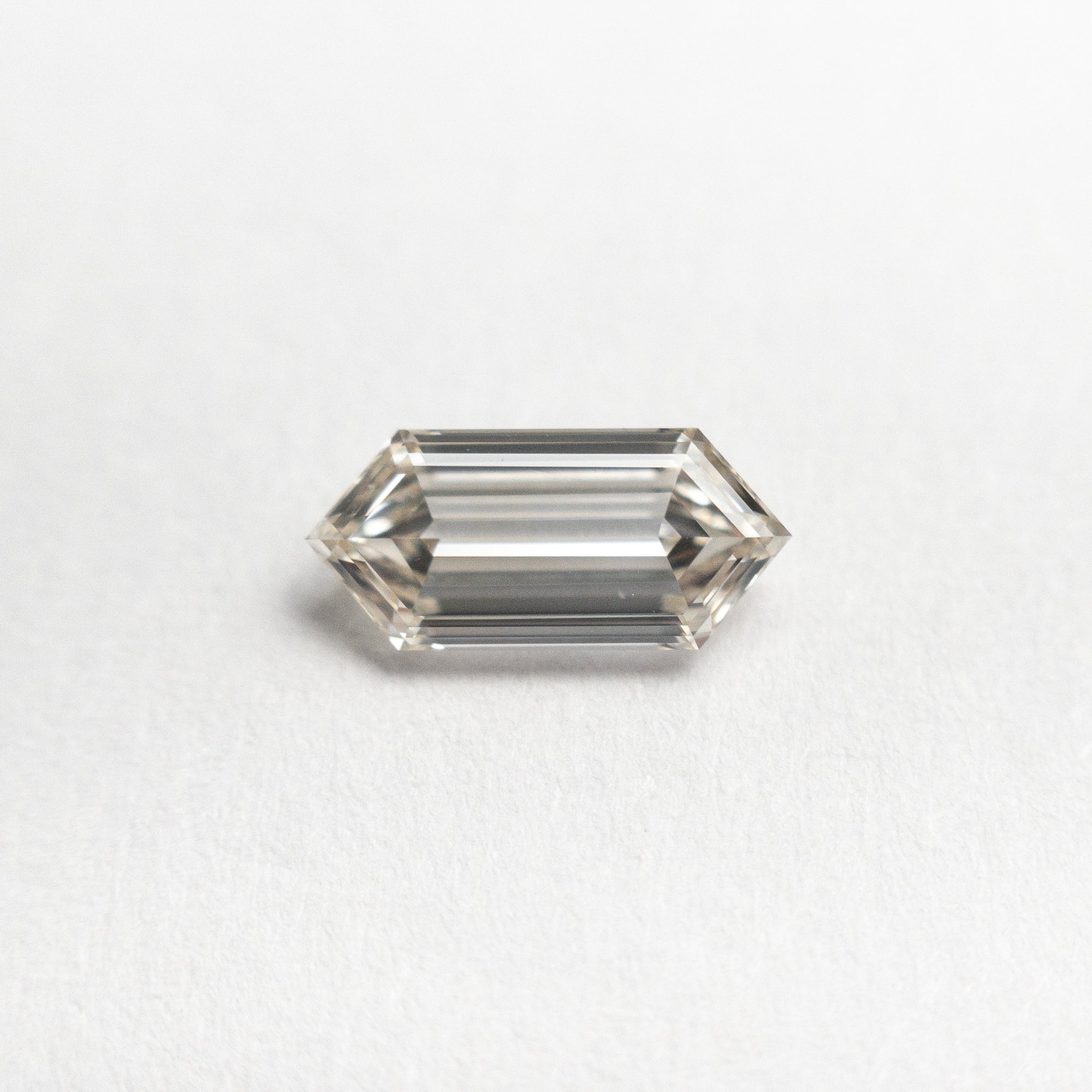 0.62ct 8.22x3.73x2.14mm VS1 O-P Hexagon Step Cut 🇨🇦 21245-01
